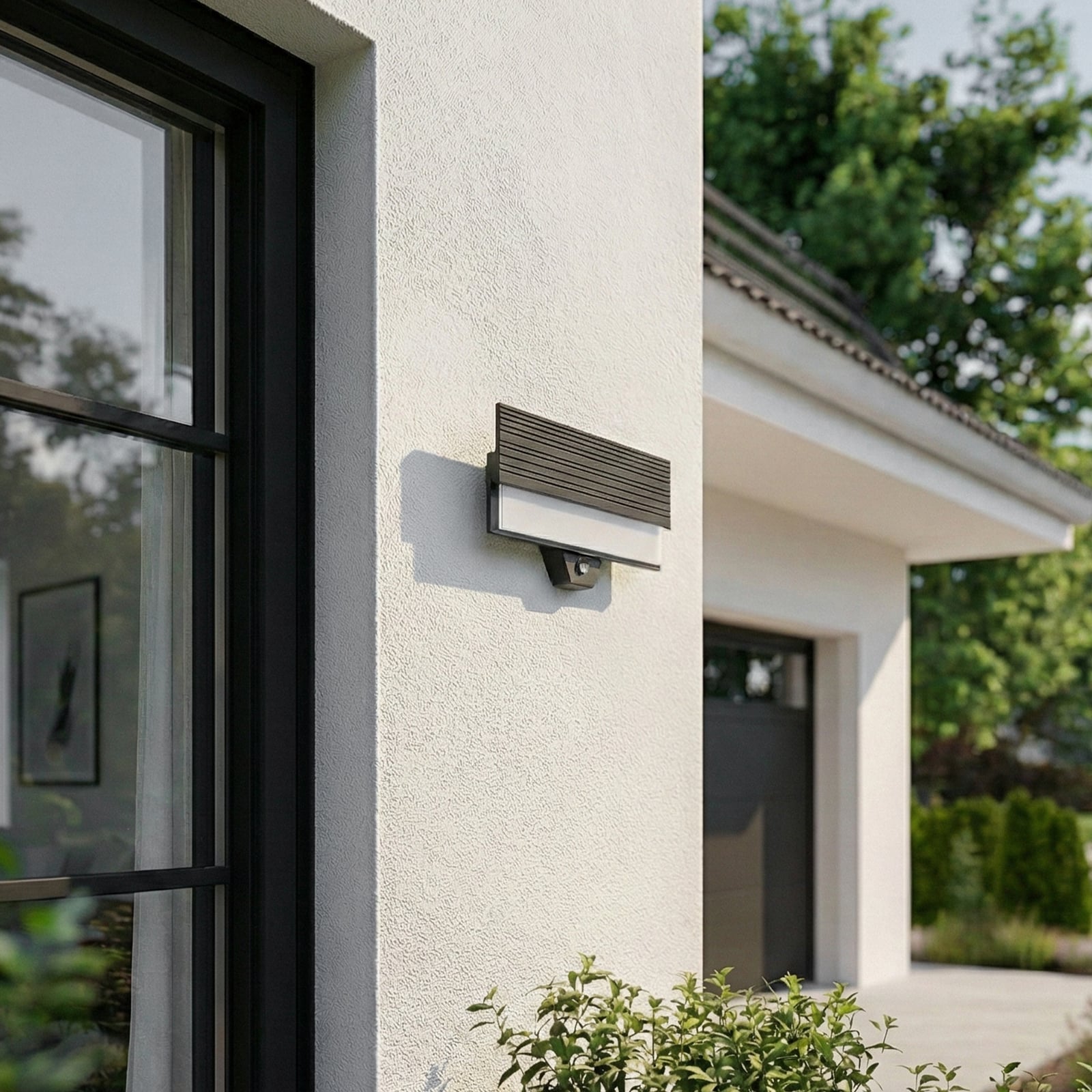 Lucande LED-Außenwandleuchte Melira, Sensor, anthrazit, IP65 Lucande LED-Außenwandleuchte Melira, Sensor, anthrazit, IP65