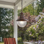 Vonkajšie závesné svietidlo Station, hrdzavohnedá, Ø 22 cm, kov/sklo