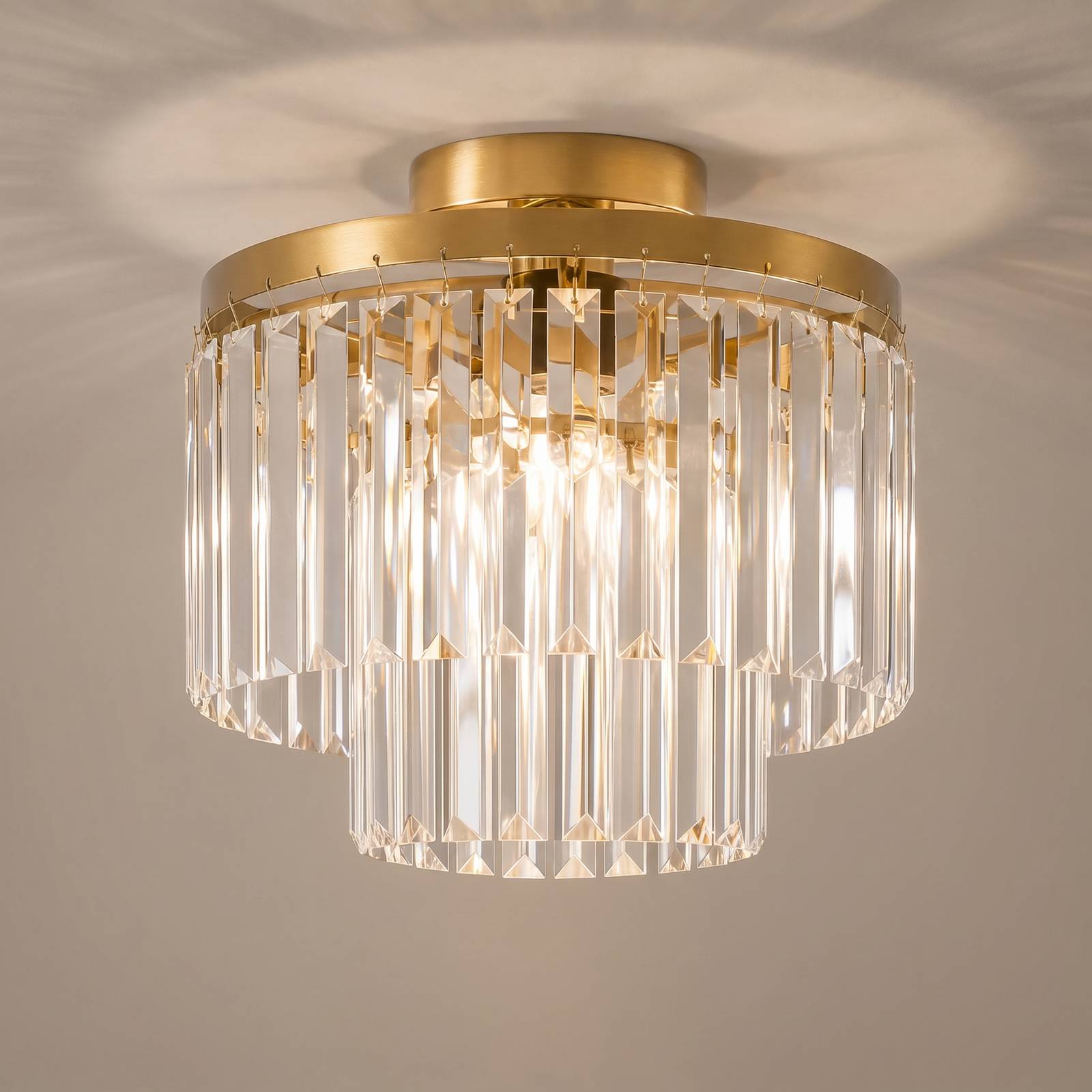 Lampa sufitowa Lindby Felicity, Ø 30 cm, mosiądz, szkło kryształowe