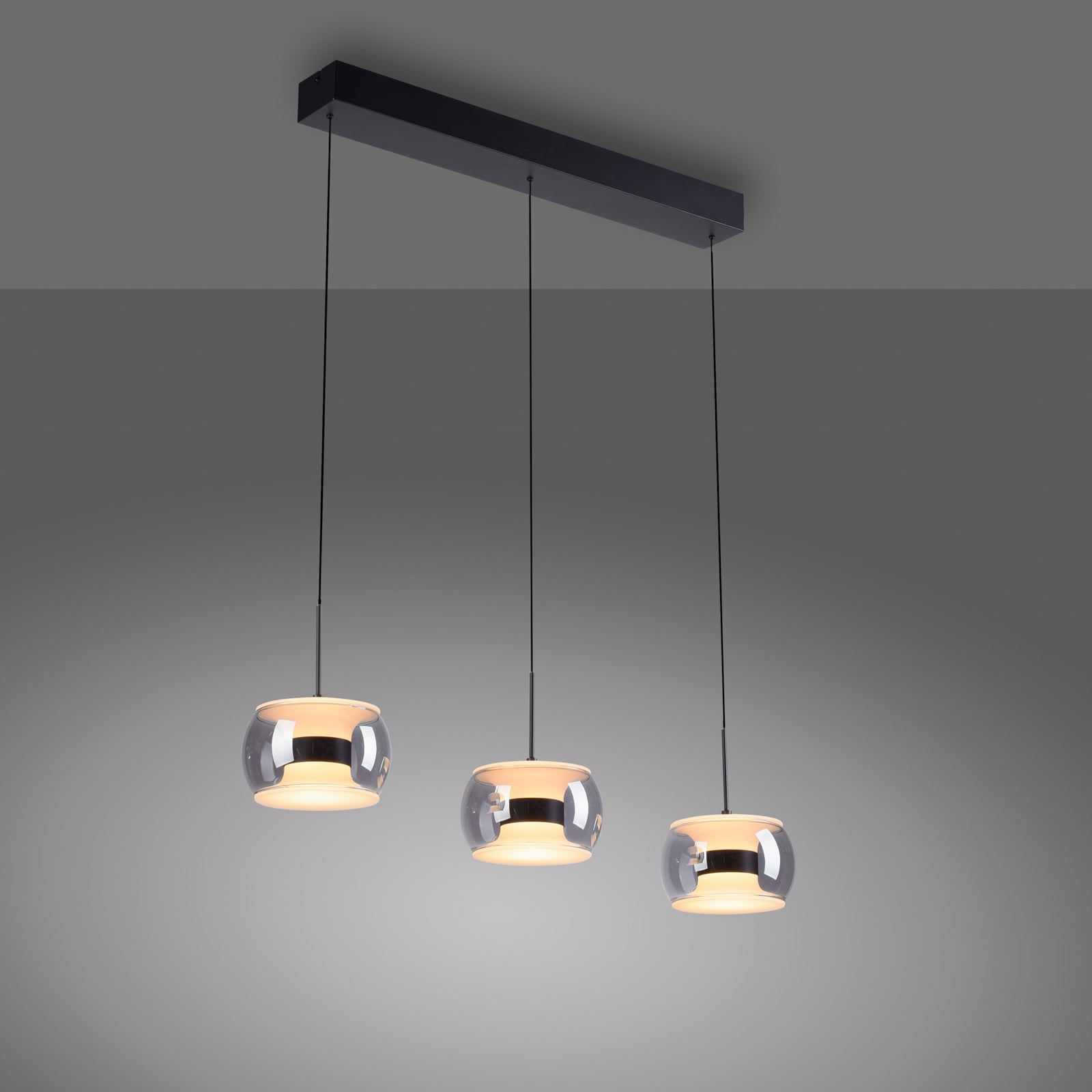LED piekaramā lampa „Fumea“, garums 71 cm, melna/dūmu krāsā, stikls, CCT, 3 LED piekaramā lampa „Fumea“, garums 71 cm, melna/dūmu krāsā, stikls, CCT, 3