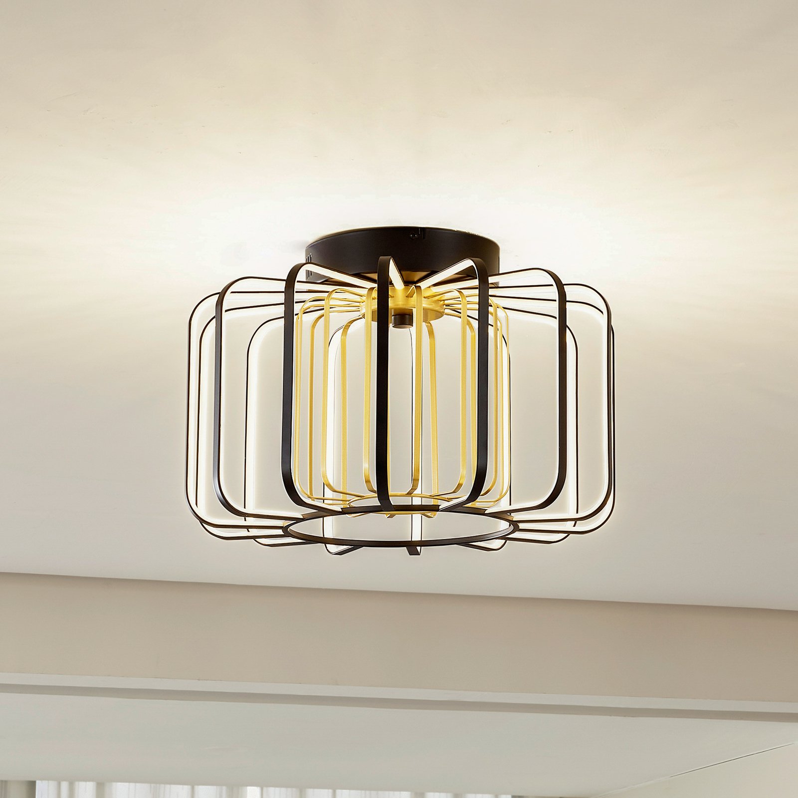 Lucande LED ceiling light Birger, Ø 39.5cm, black/gold