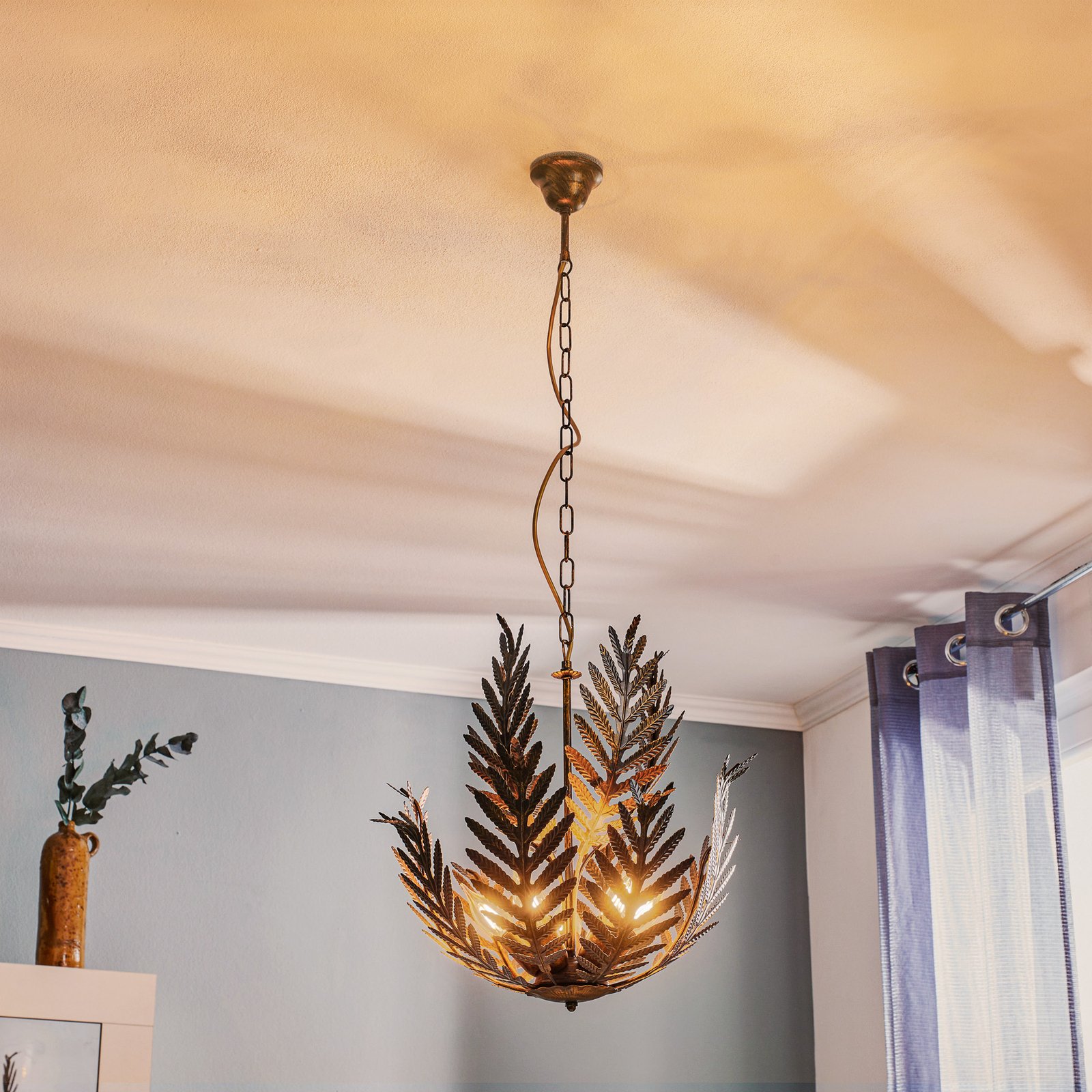 Felce hanging light as a fern in bronze