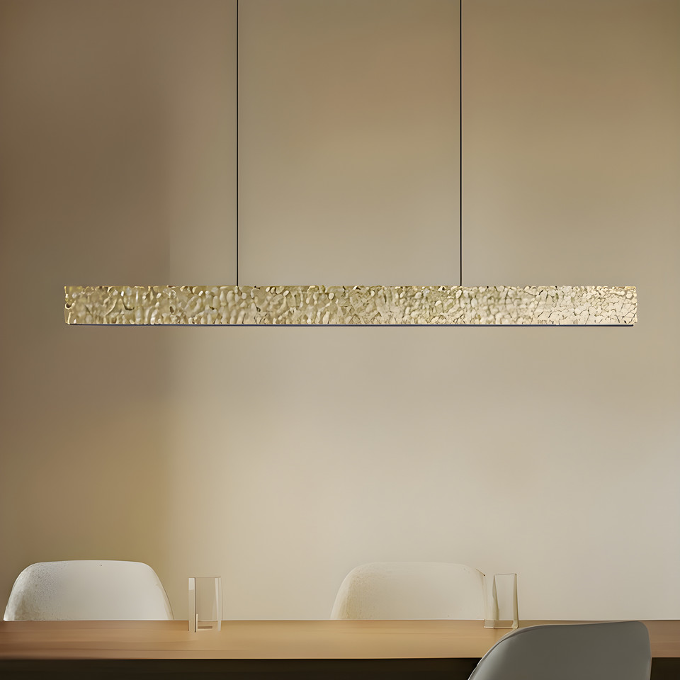 Lucande Nivara LED-hänglampa 117 cm metall, guld / mässing från Lucande
