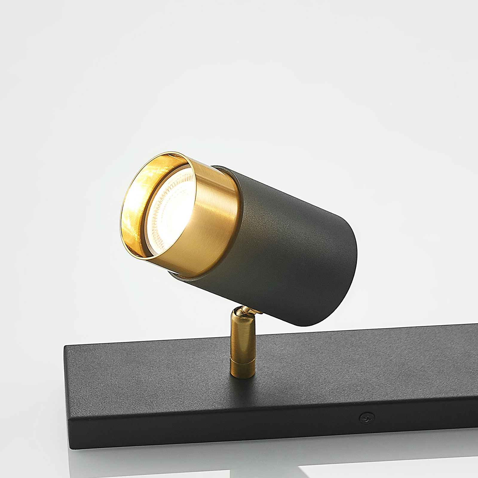 Arcchio Evaro spot, gouden ring voor, 3-lamps
