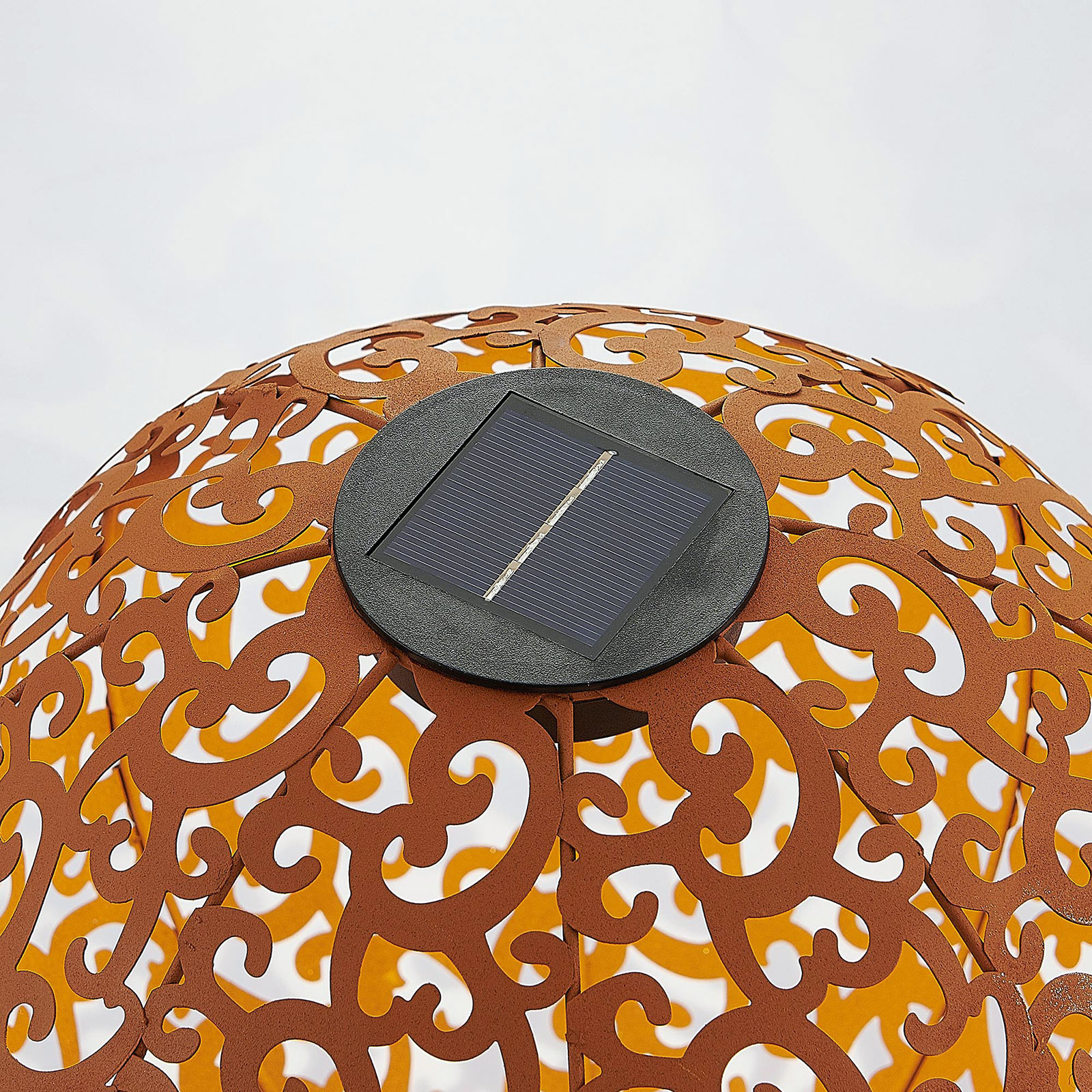 Lámpara solar LED Eduta, esfera, color óxido