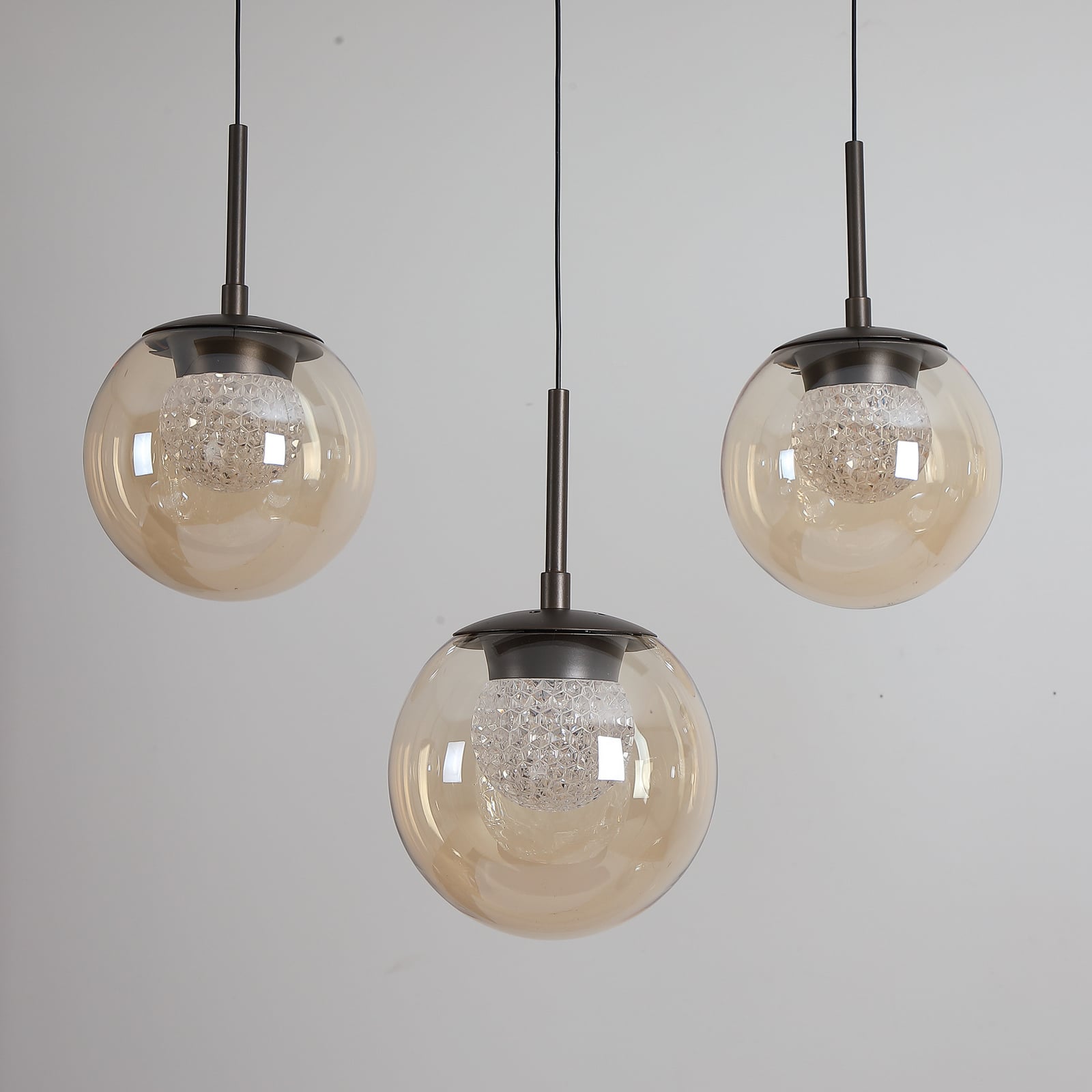 LED-Hängeleuchte Solis, 7-fl. lang, bronze, Glas, 2.700 K LED-Hängeleuchte Solis, 7-fl. lang, bronze, Glas, 2.700 K