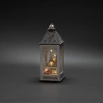 Lanterne déco LED avec maison et père Noël