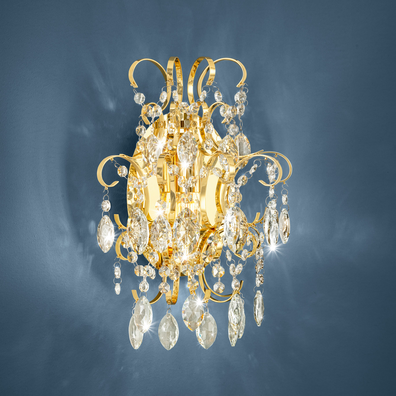 Stars of Light Fenoullet wall light, brass, height 37 cm