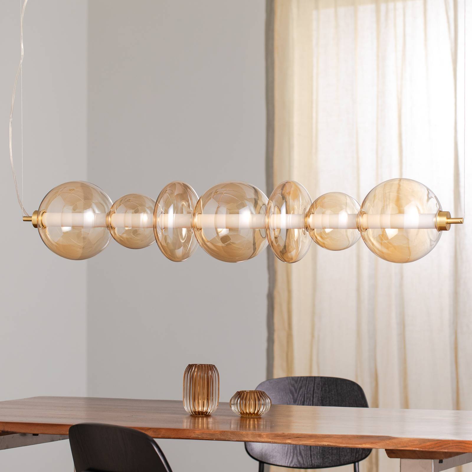 Lampa wisząca LED Daphne, bursztynowo-przezroczyste szkło, długość 118 cm