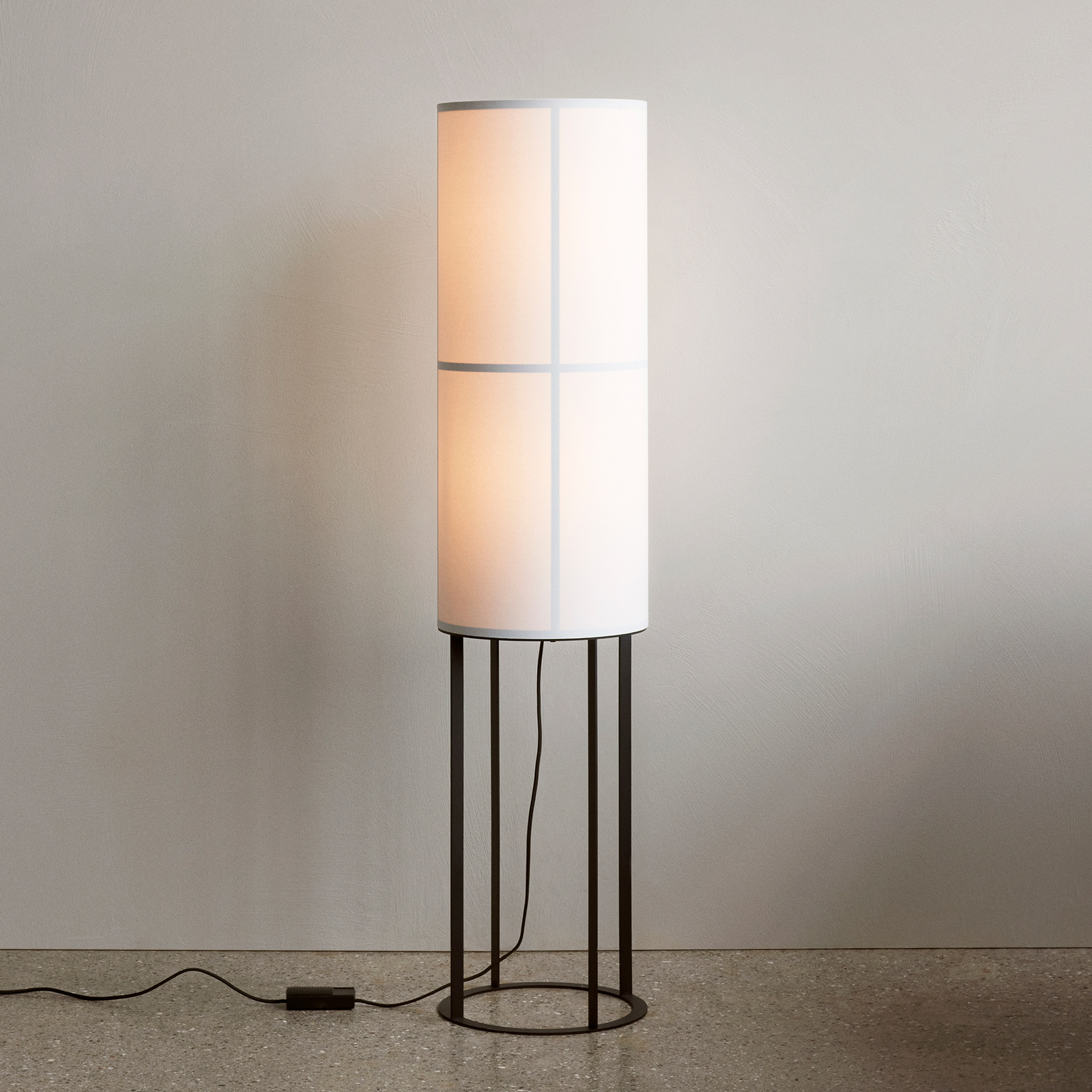 Audo Hashira floor lamp with a metal base