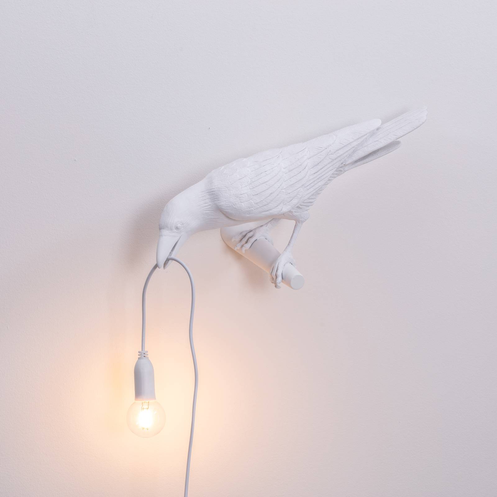 Kinkiet LED Bird Lamp, zwrócony w lewo, biały