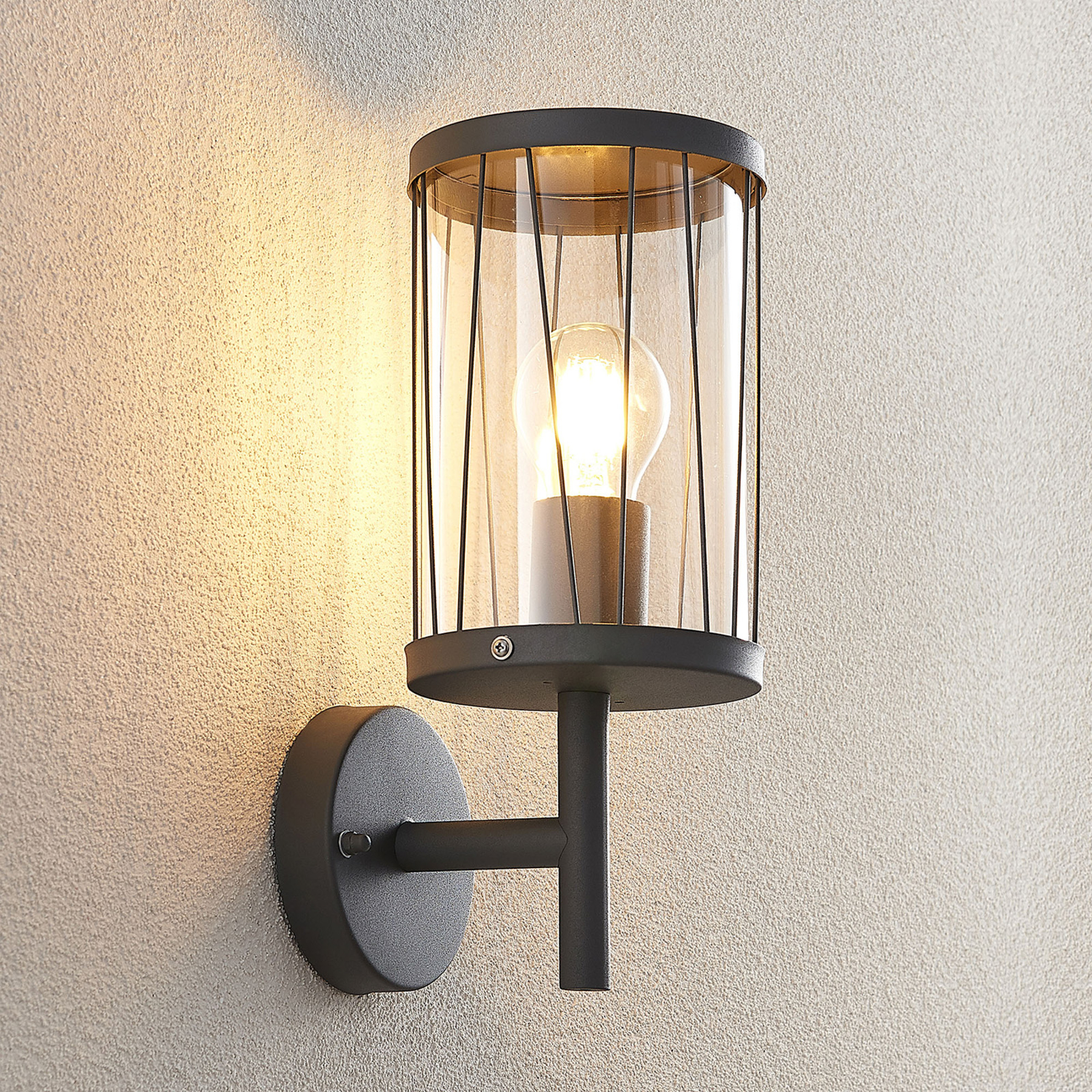 Lindby Yonan outdoor wall lamp, round, grey, E27, stainless steel, polycarbonate, E27, 40 W, energy efficiency: A++, W: 13.4 cm, H: 31.6 cm