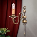 Imke 1-bulb wall light, antique brass dark patina