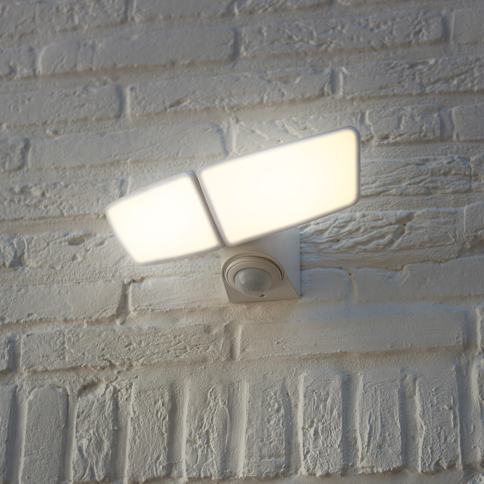 Artica LED outdoor wall light white with a sensor