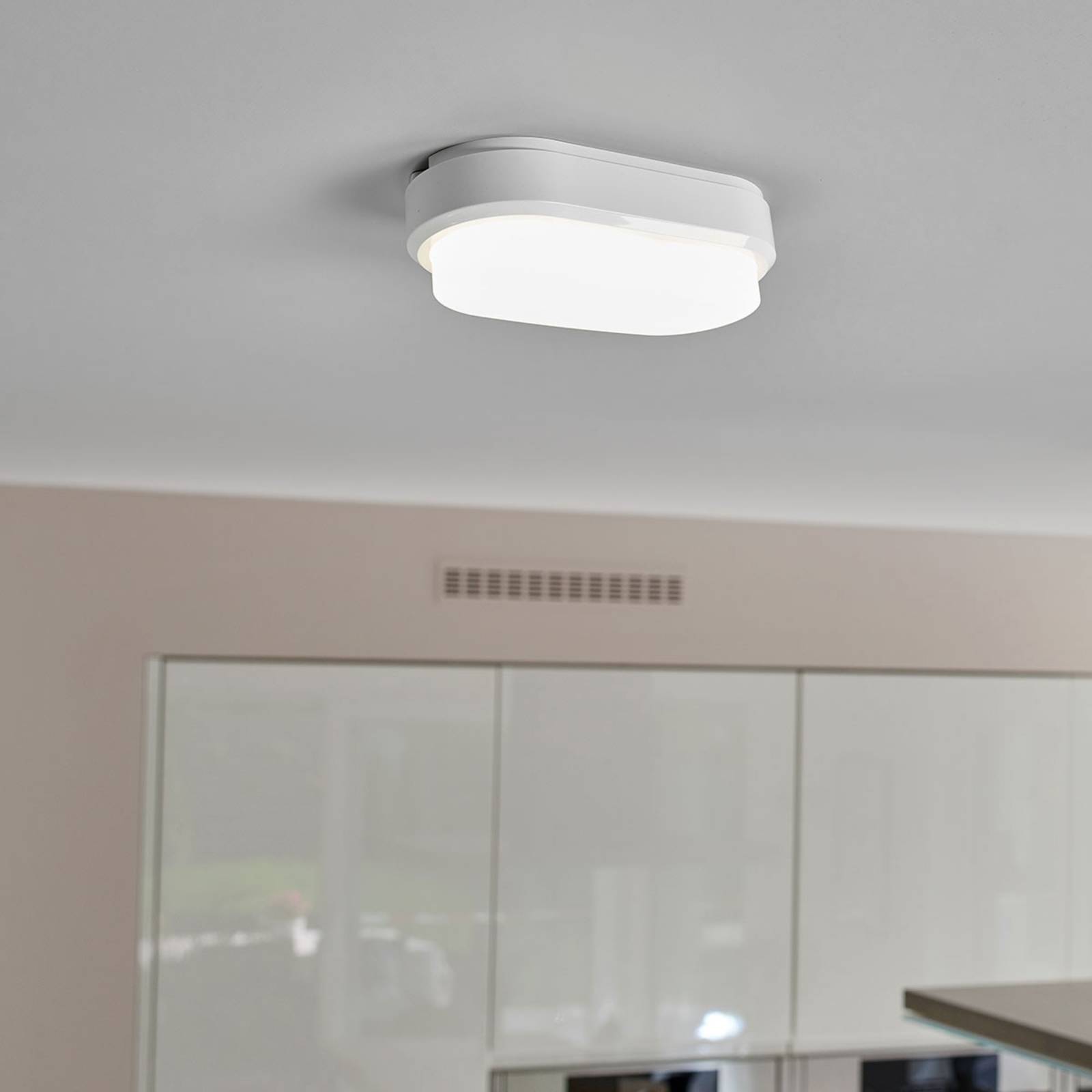 LED-taklampa Ipsum med sensor, vit, oval