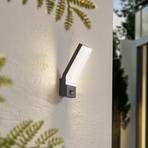Aplique de exterior Lindby LED Korvik, aluminio, gris oscuro, sensor