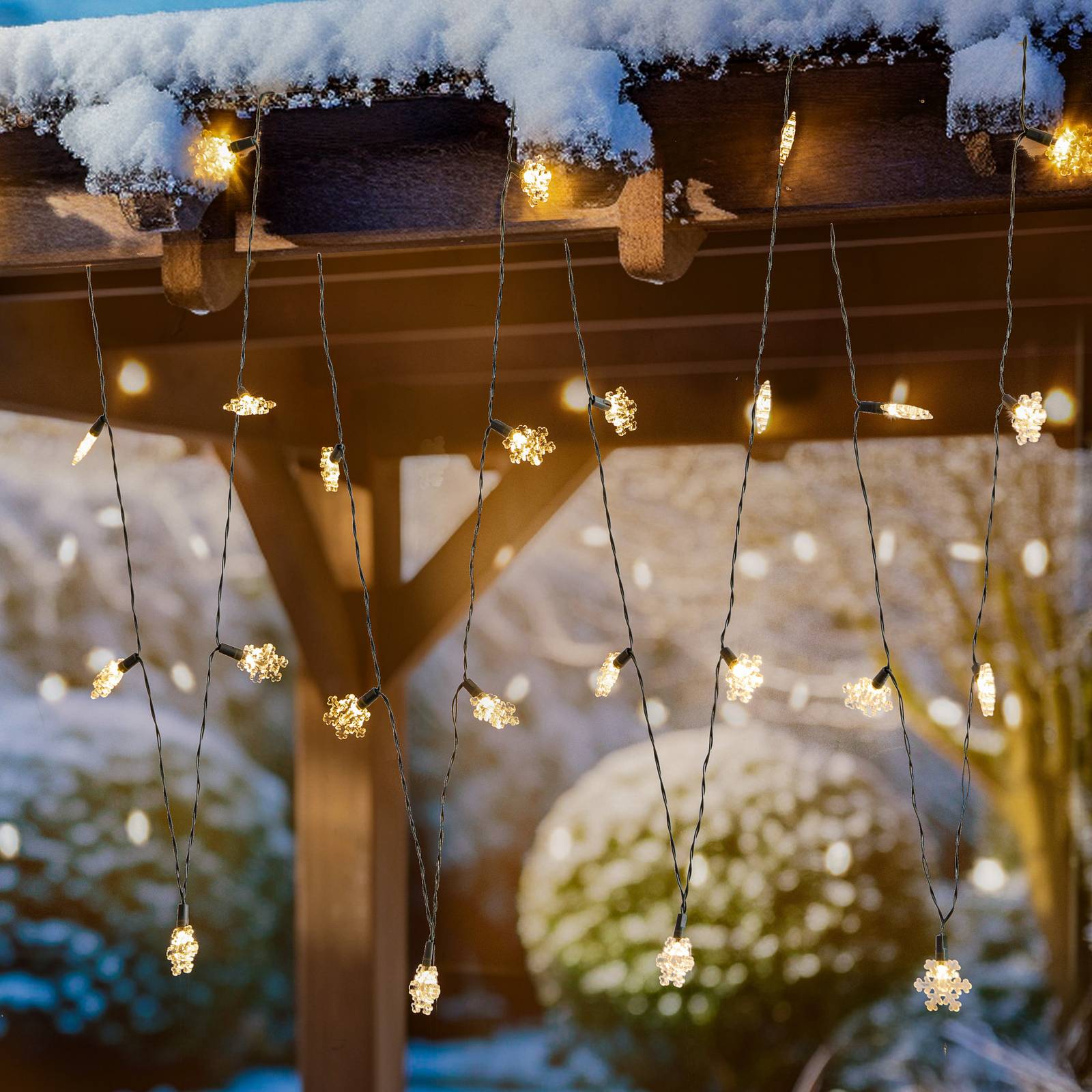 Levně Lindby LED pohádková světla Parrik, sněhové vločky, 620 cm, IP44