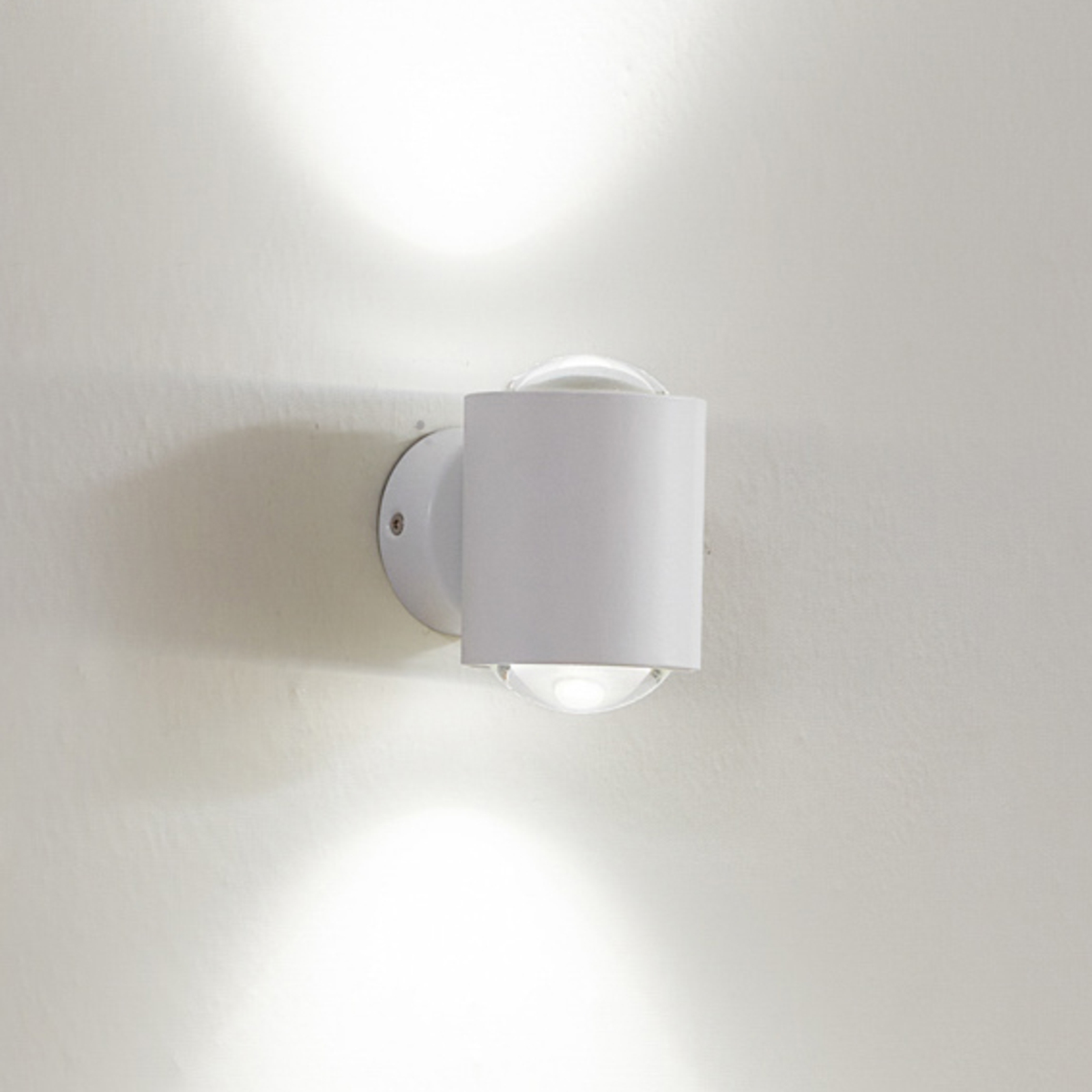 Lindby wall spotlight Jyla, white, 3,000 K, up/down, lens