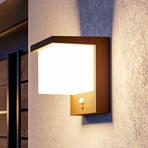 LED buiten wandlamp Frigento roestkleurig, hoogte 15 cm, sensor