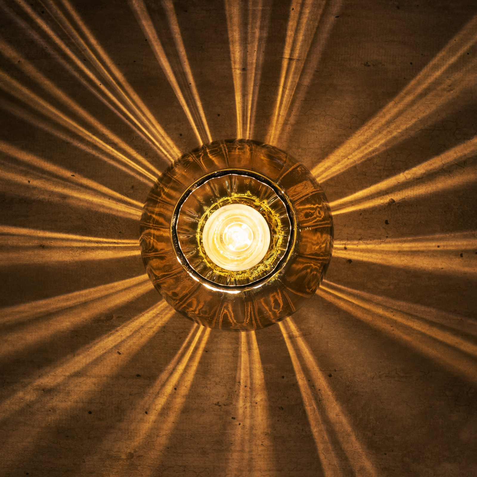 Devi ceiling light made of glass, amber