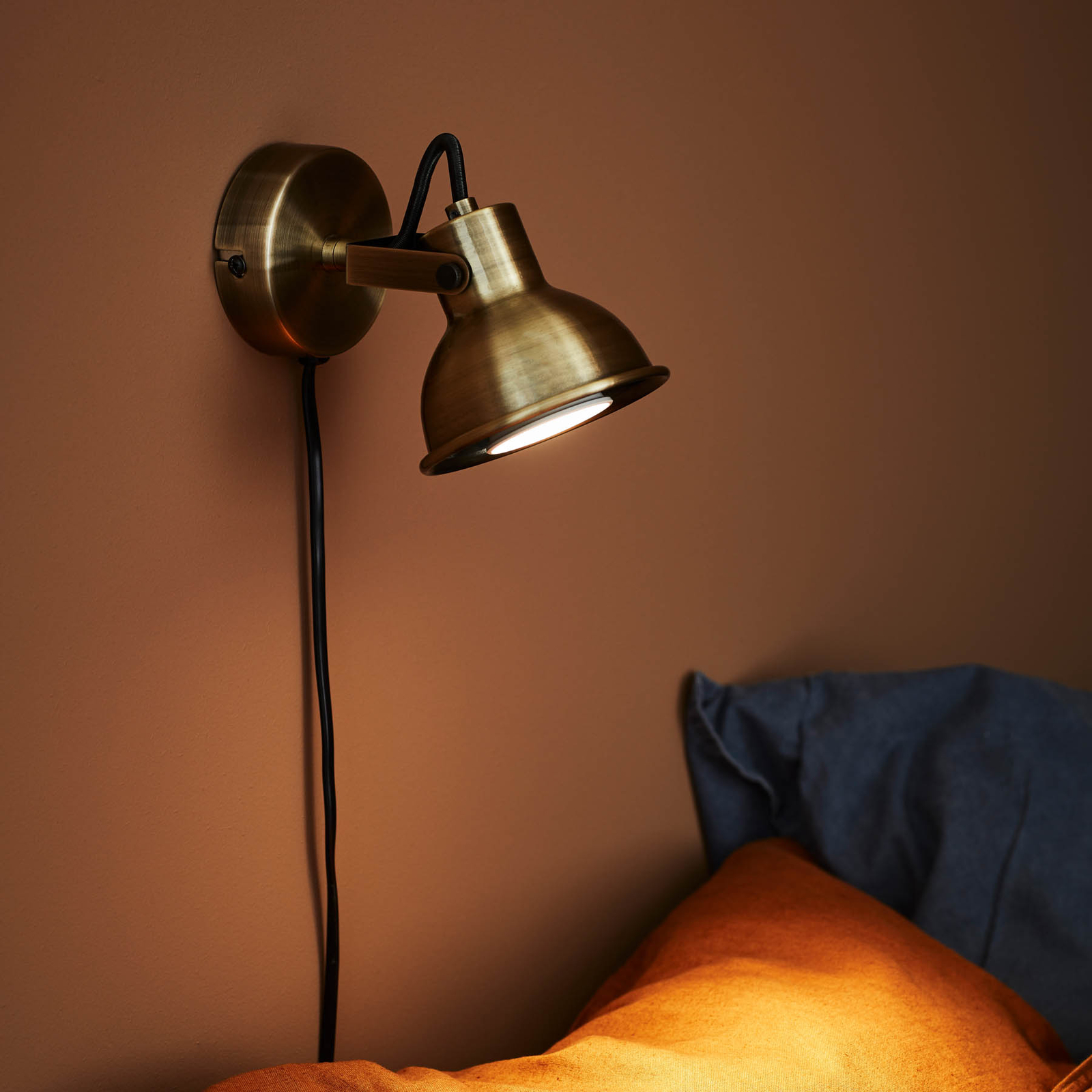 Rocco wall light with switch in antique brass