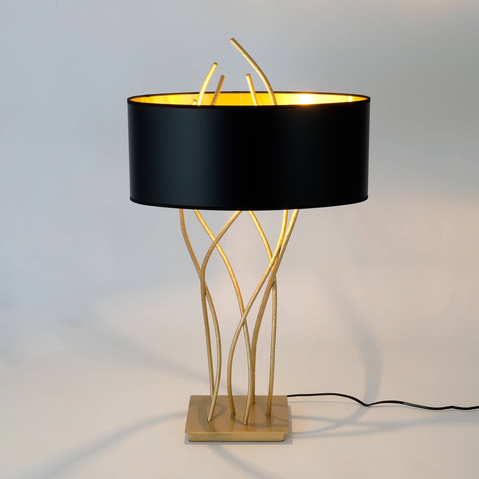 E-shop Oválna stolová lampa Elba, zlatá/čierna, výška 75 cm, železo