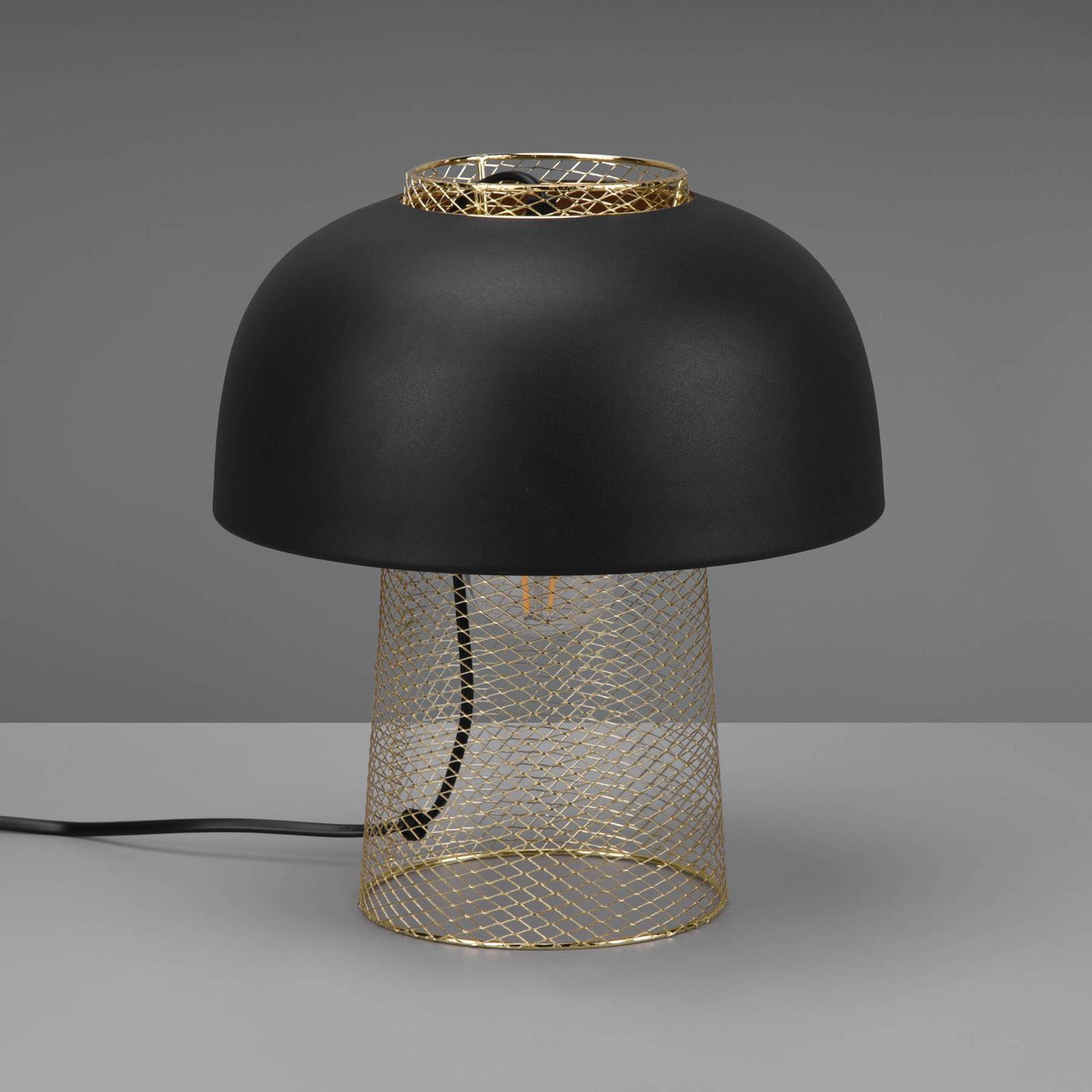 Reality Leuchten Punch table lamp, black/gold, Ø 25 cm