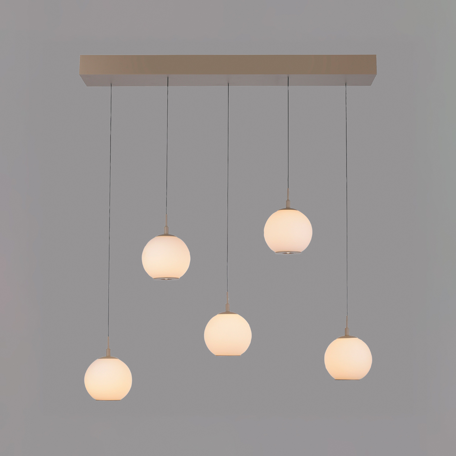 Suspension LED Sandora, couleur sable, longueur 92 cm, verre, à 5 lampes Suspension LED Sandora, couleur sable, longueur 92 cm, verre, à 5 lampes