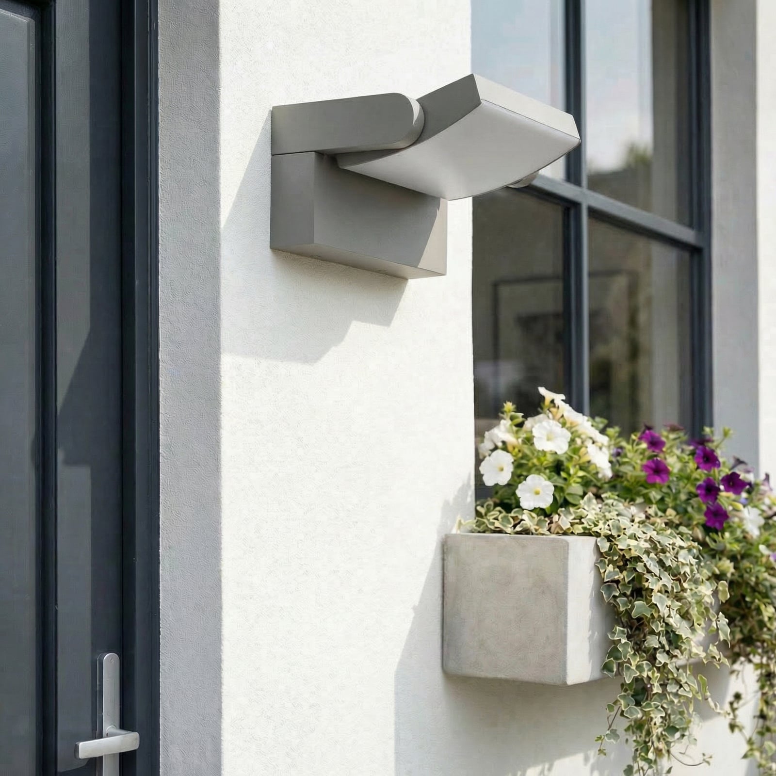 Sherin LED-utomhusvägglampa, IP54, grå, vridbar – Lindby