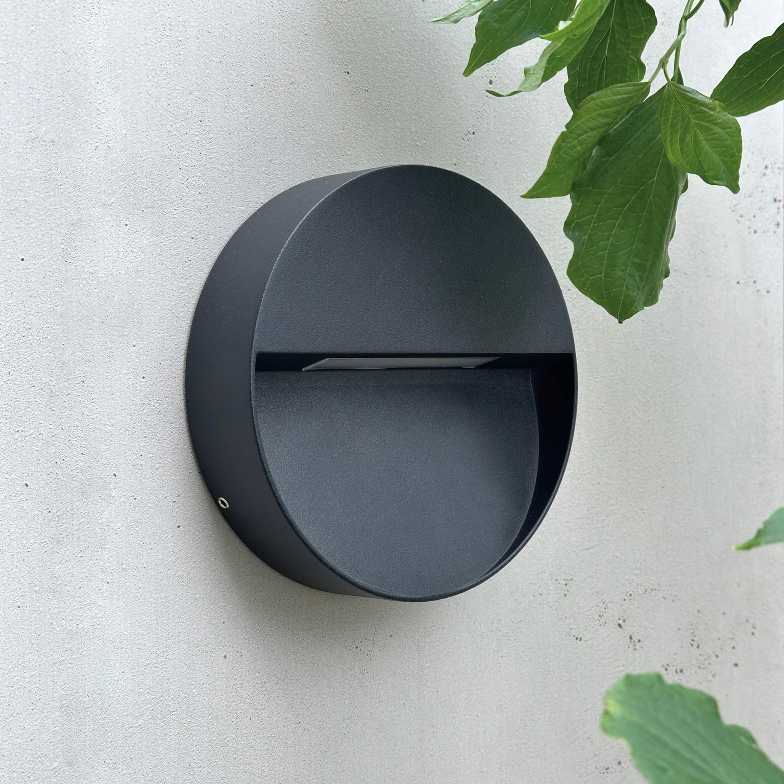 Dyberg Larsen LED outdoor wall lamp Pluto, black, Ø 15 cm