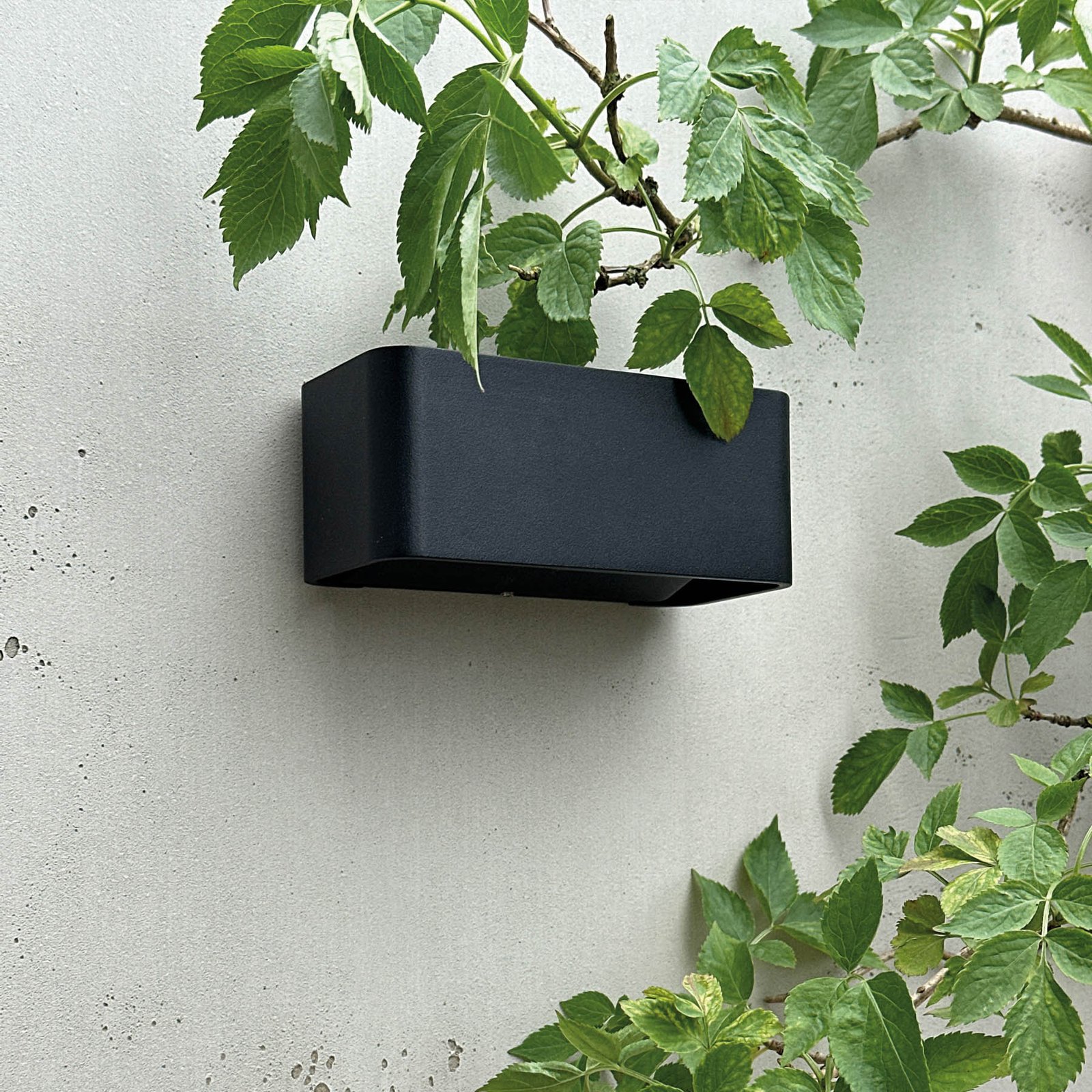 Dyberg Larsen Saturn LED outdoor wall lamp, black, 14.7 cm