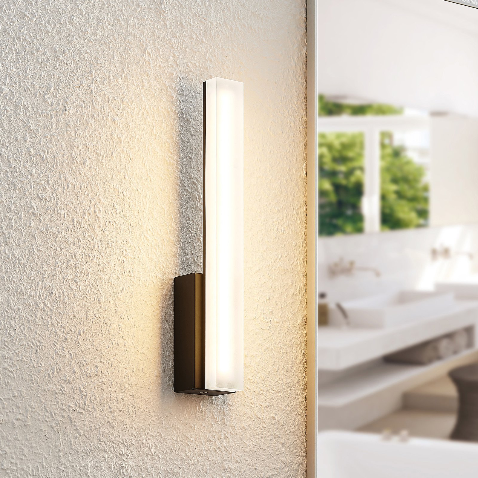 Lucande Lisana LED wall light, IP44, vertical
