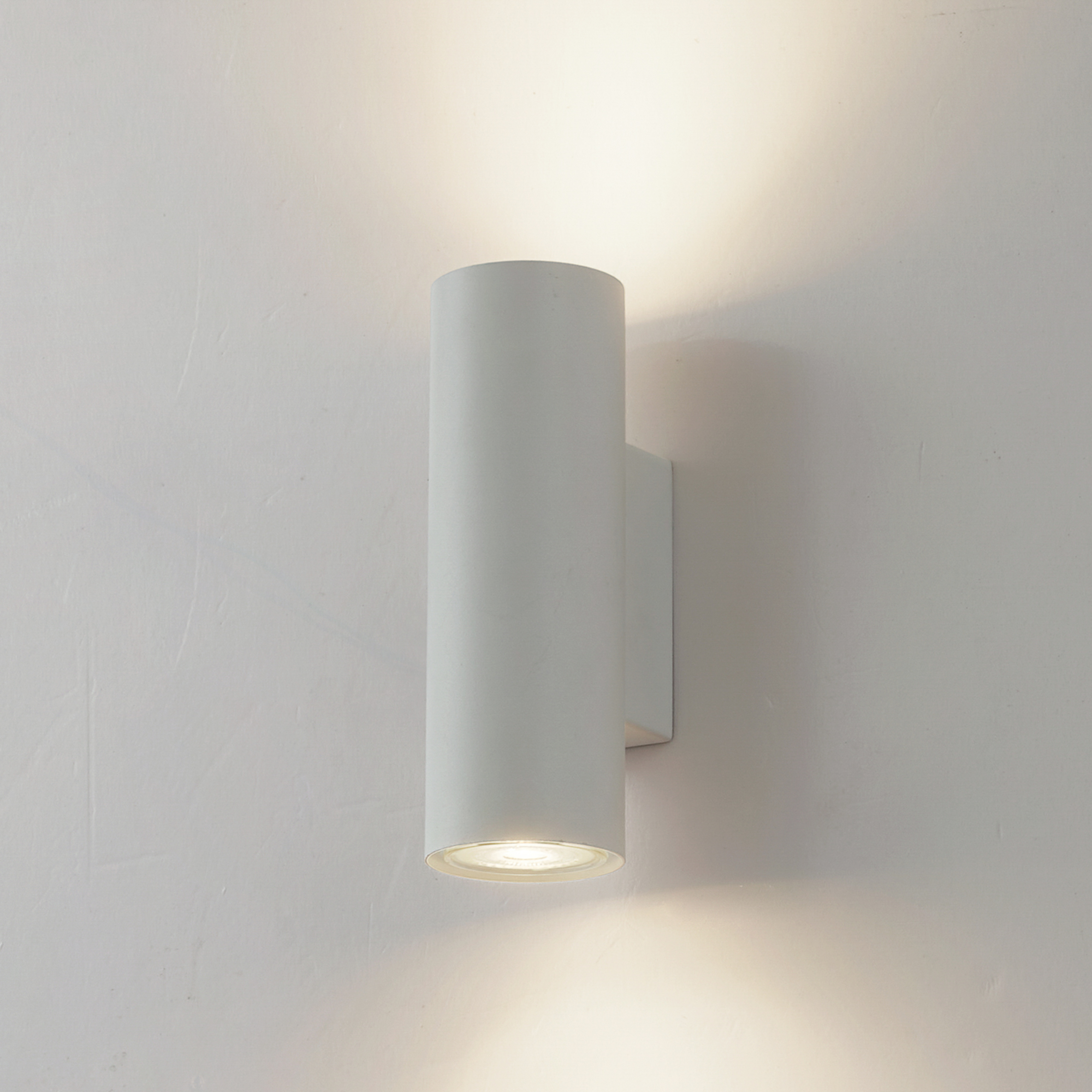 Lindby wall light Joffrey, 18 cm, white, up/down, GU10