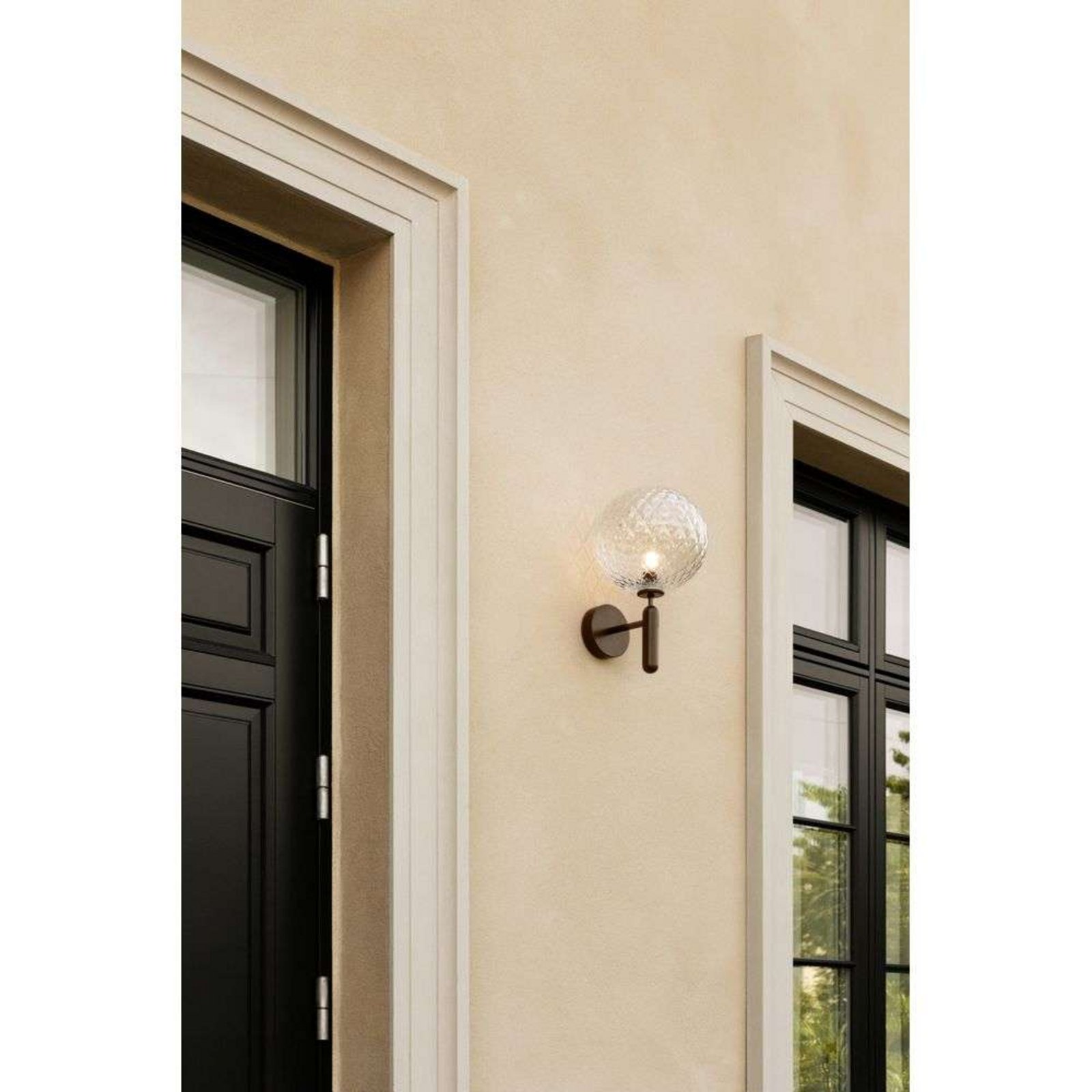 Nuura buitenwandlamp Miira, Ø 20 cm, donkerbrons/helder