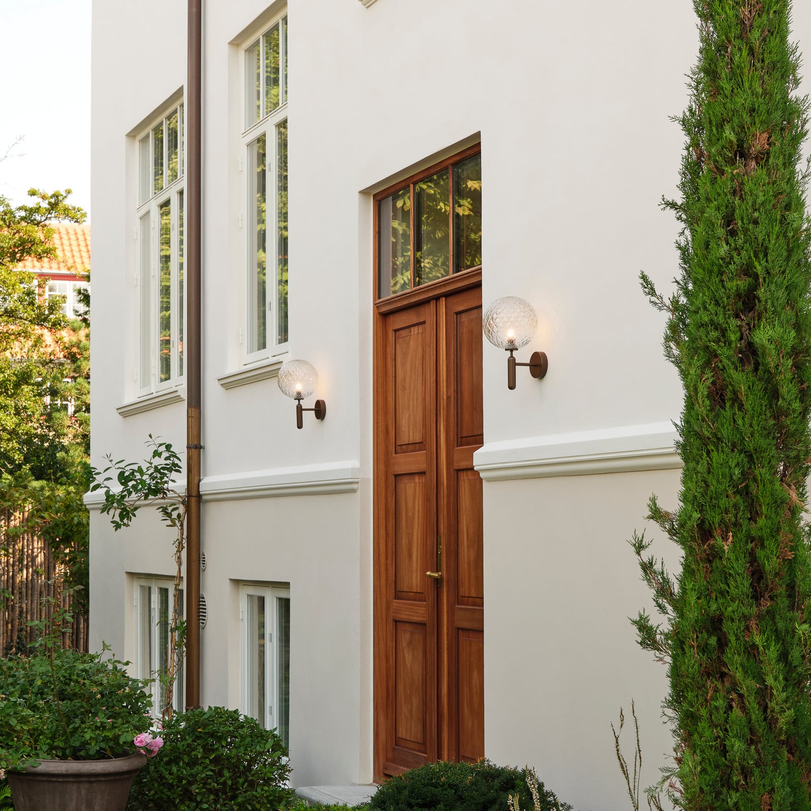 Nuura Außen-Wandlampe Miira, Ø 20 cm, bronze dunkel/klar Nuura Außen-Wandlampe Miira, Ø 20 cm, bronze dunkel/klar