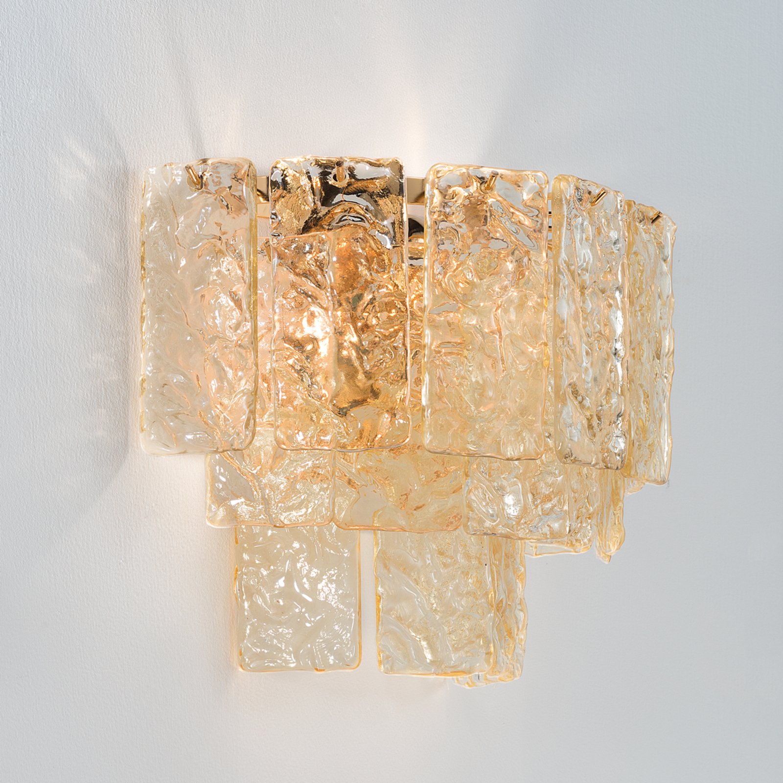 Glace glass wall light with gold mount