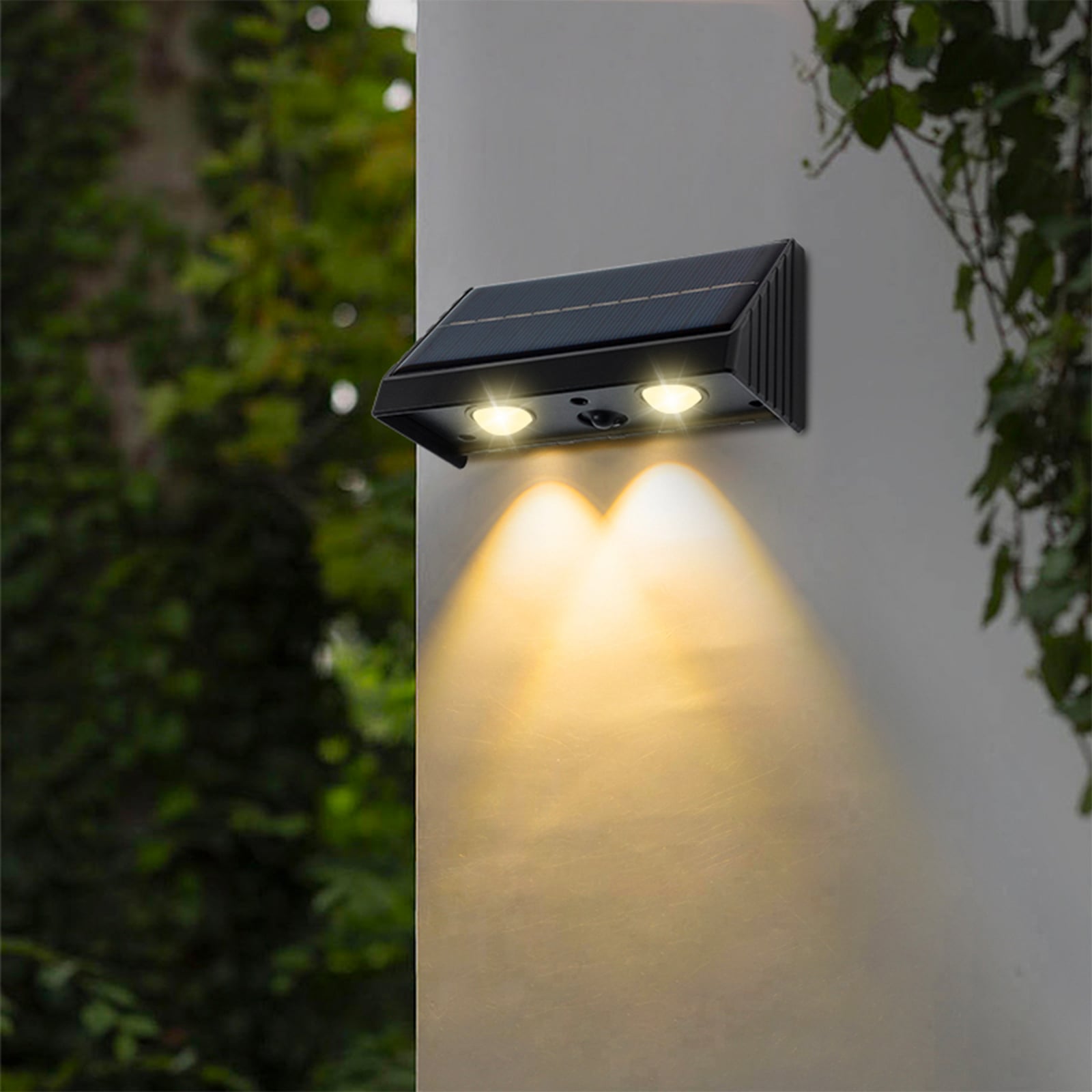 Kyla LED solar wall lamp, black, width 11 cm, set of 4
