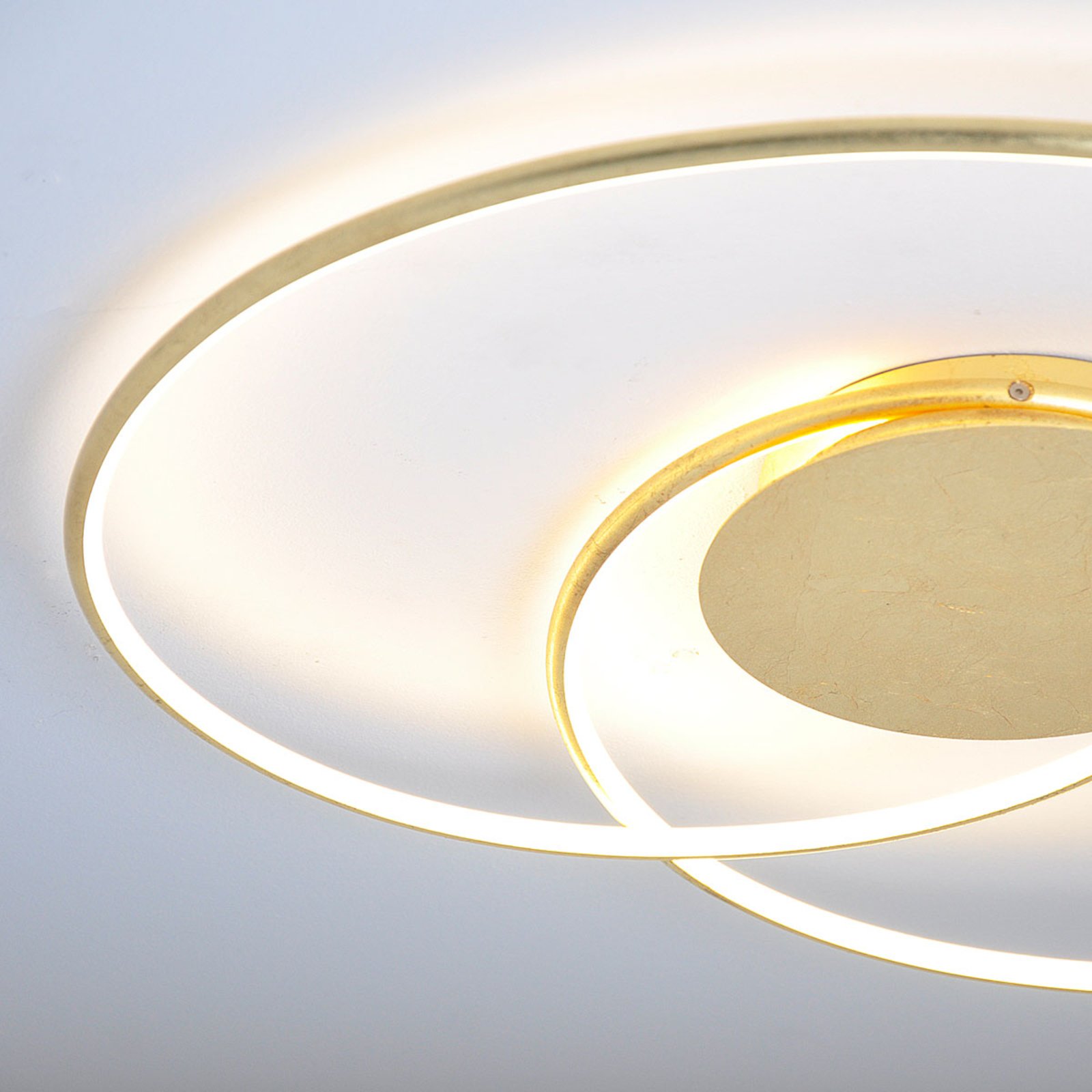 Pięknie formowana lampa sufitowa LED Joline, złoto