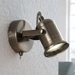 Aplique de pared Lindby Anze, 10 m, latón envejecido, interruptor