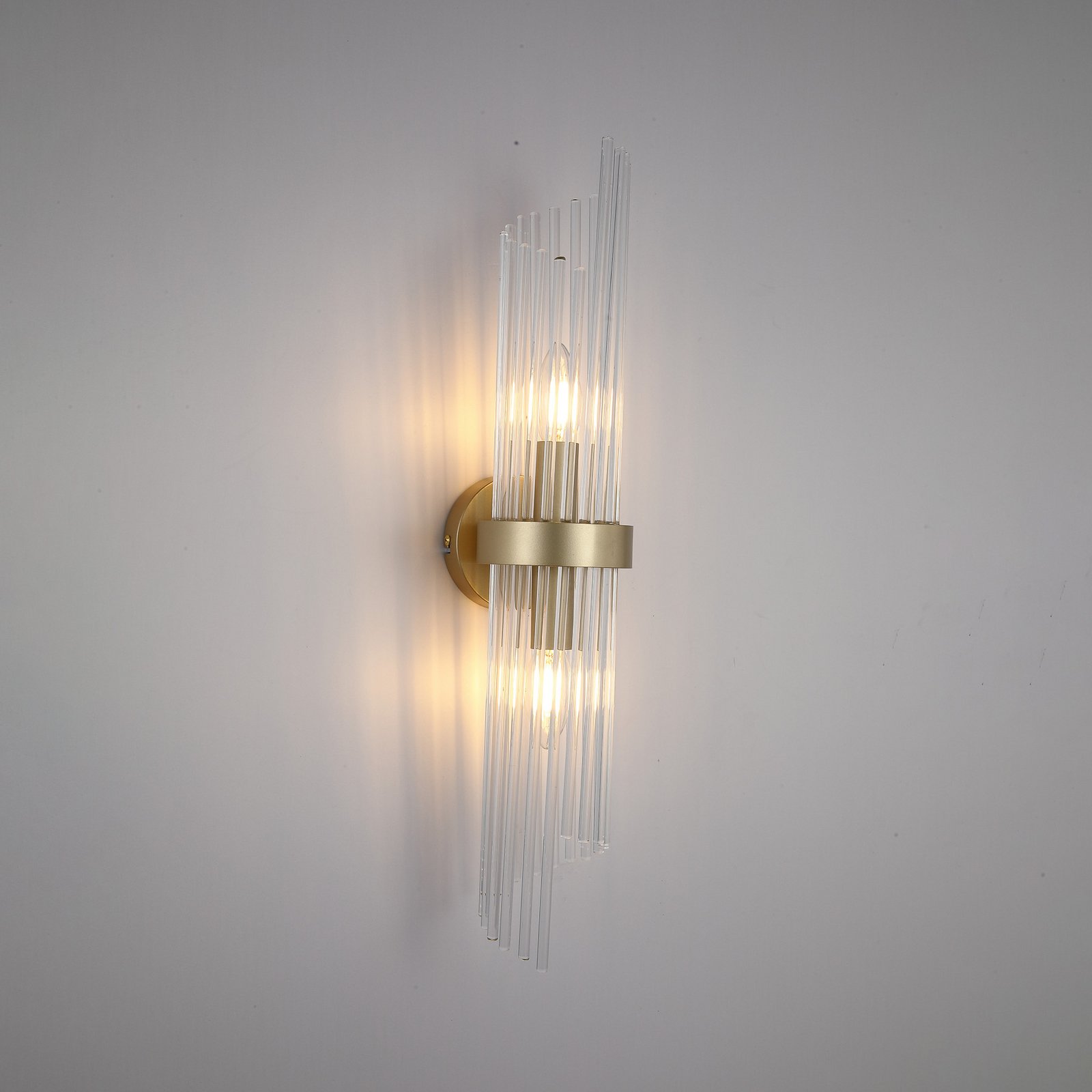 Sienas lampa Lara, augstums 56 cm, zelta krāsā/caurspīdīga, stikls/metāls