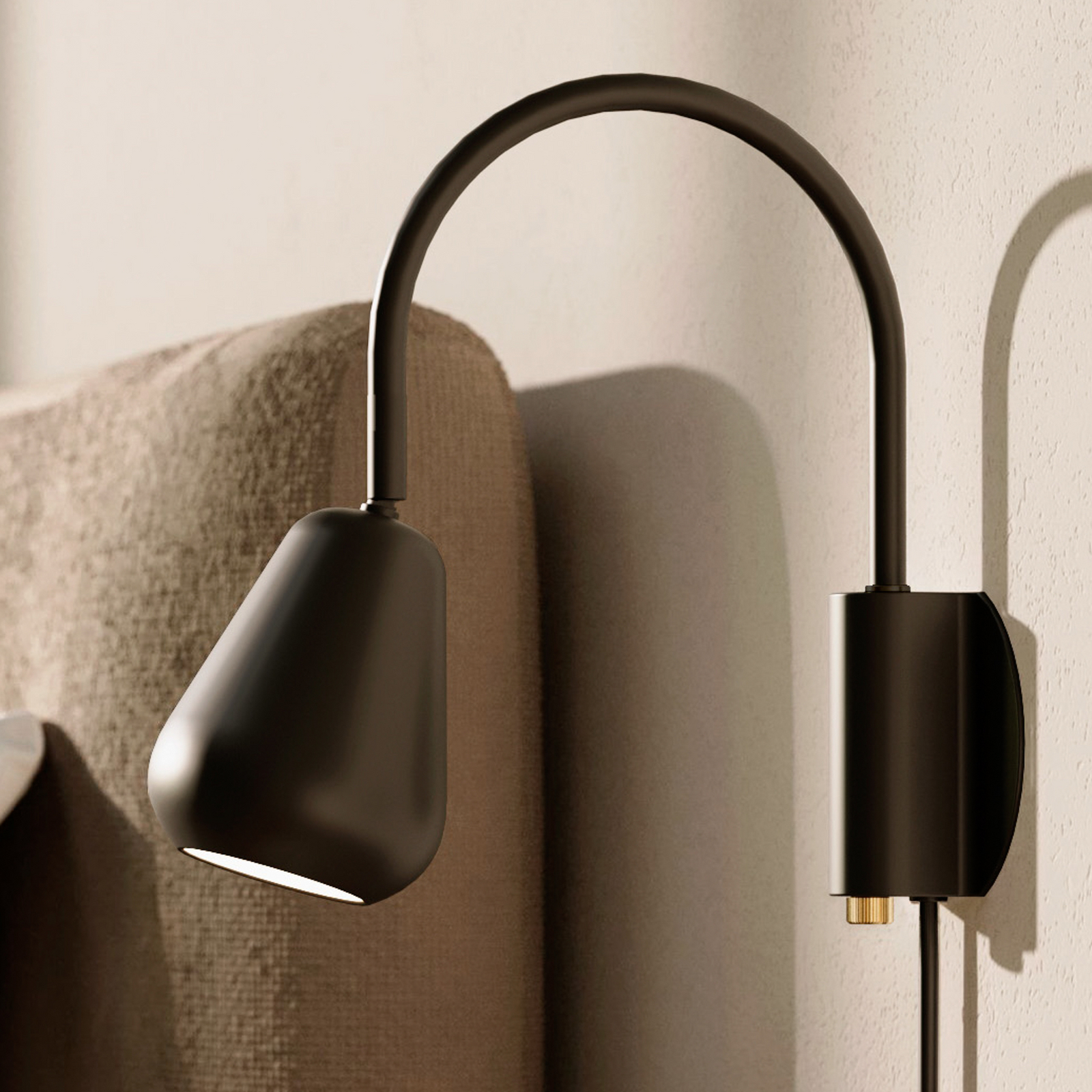 Nuura Foco de pared Anoli, negro, metal, GU10, enchufe