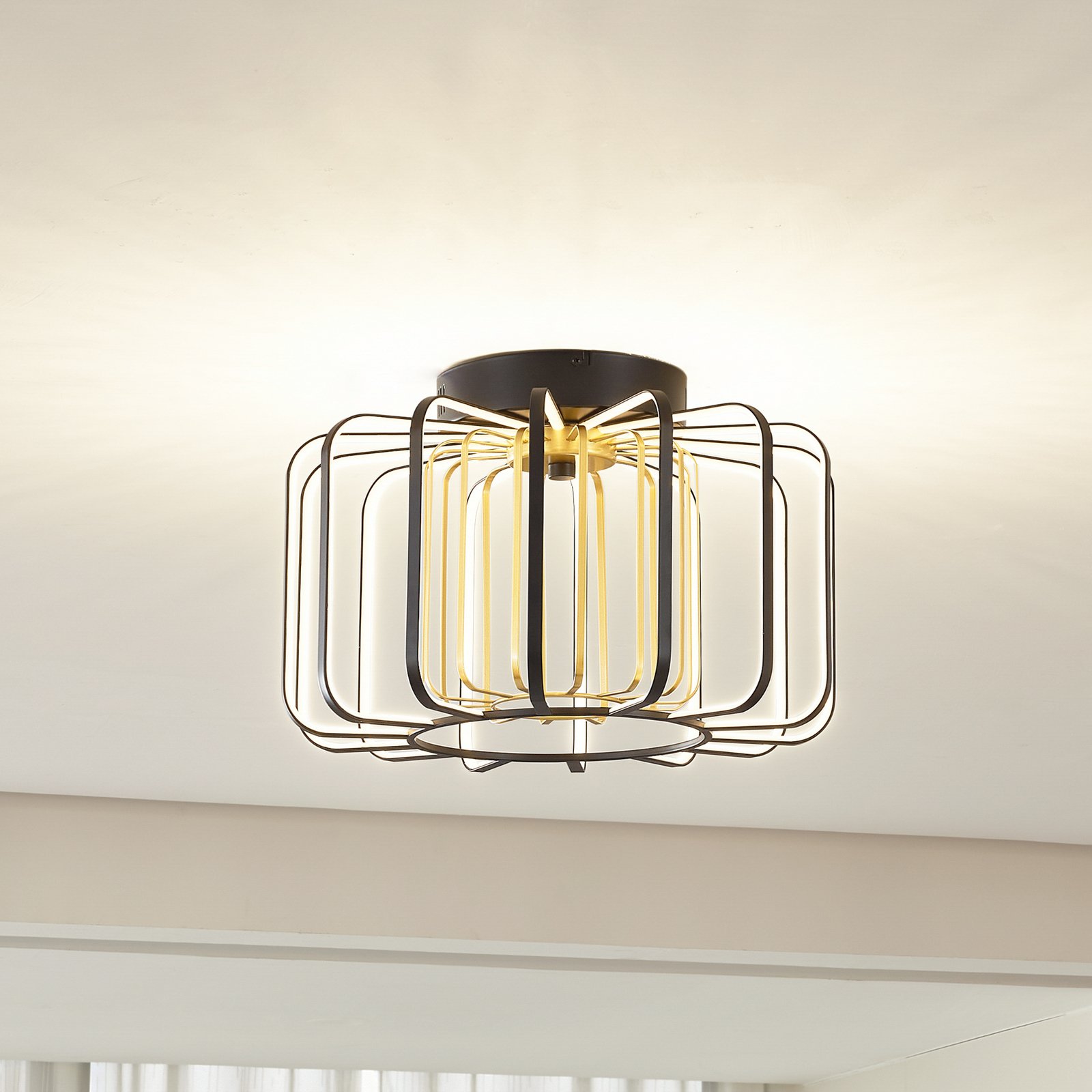 Lucande LED ceiling light Birger, height 25.5 cm, black/gold