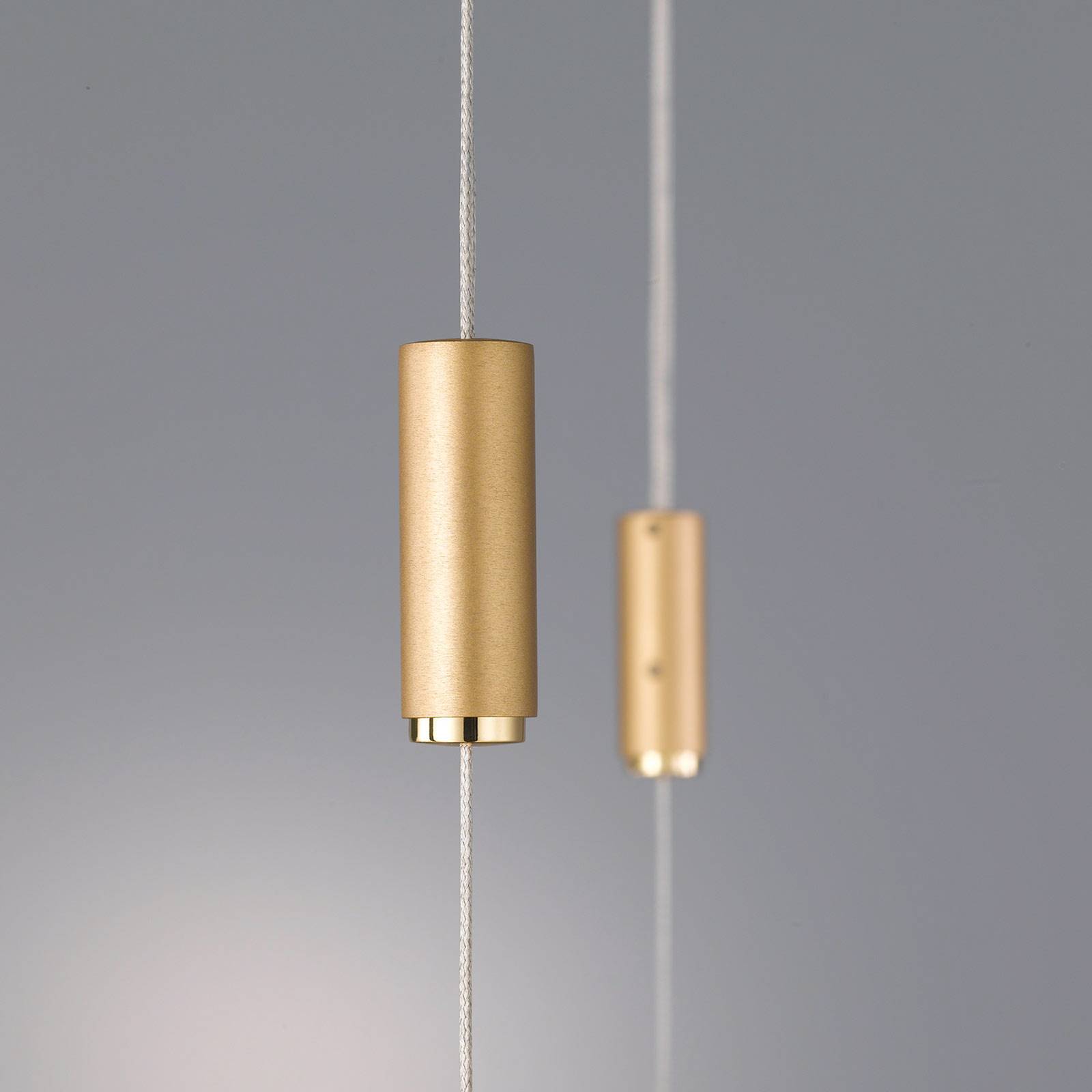Quitani lampa wisząca LED Tolu, długość 119 cm, mosiądz