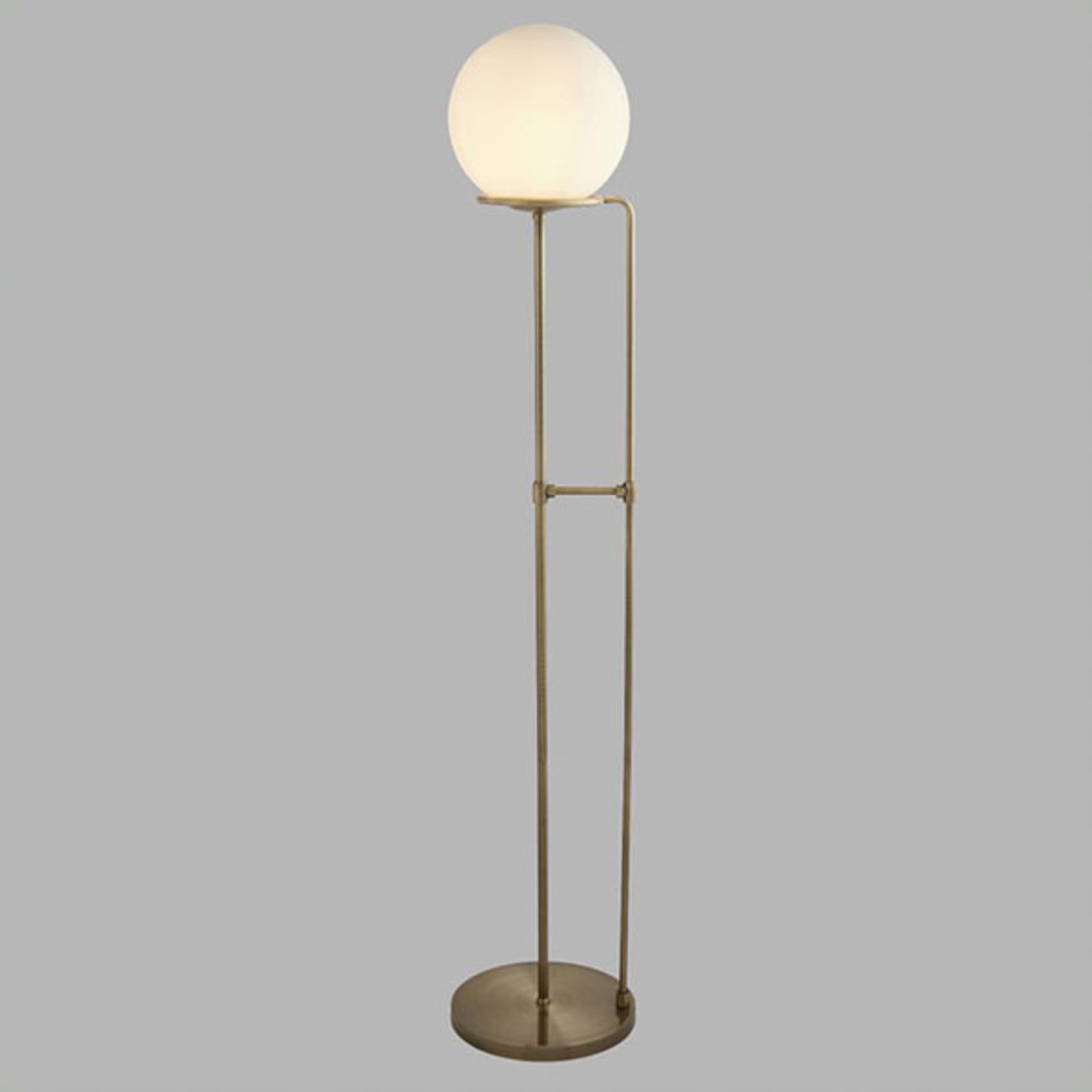 Sphere floor lamp in antique brass with glass ball