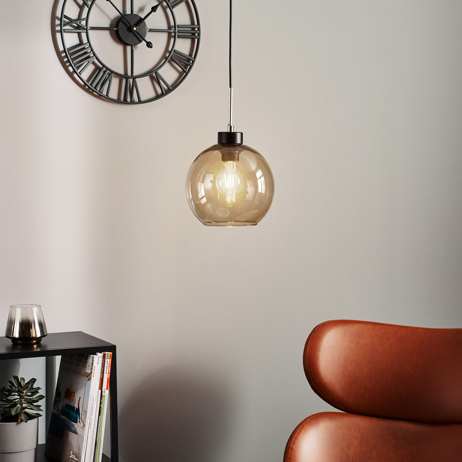 Gota hanging light with smoked glass shade in spherical shape