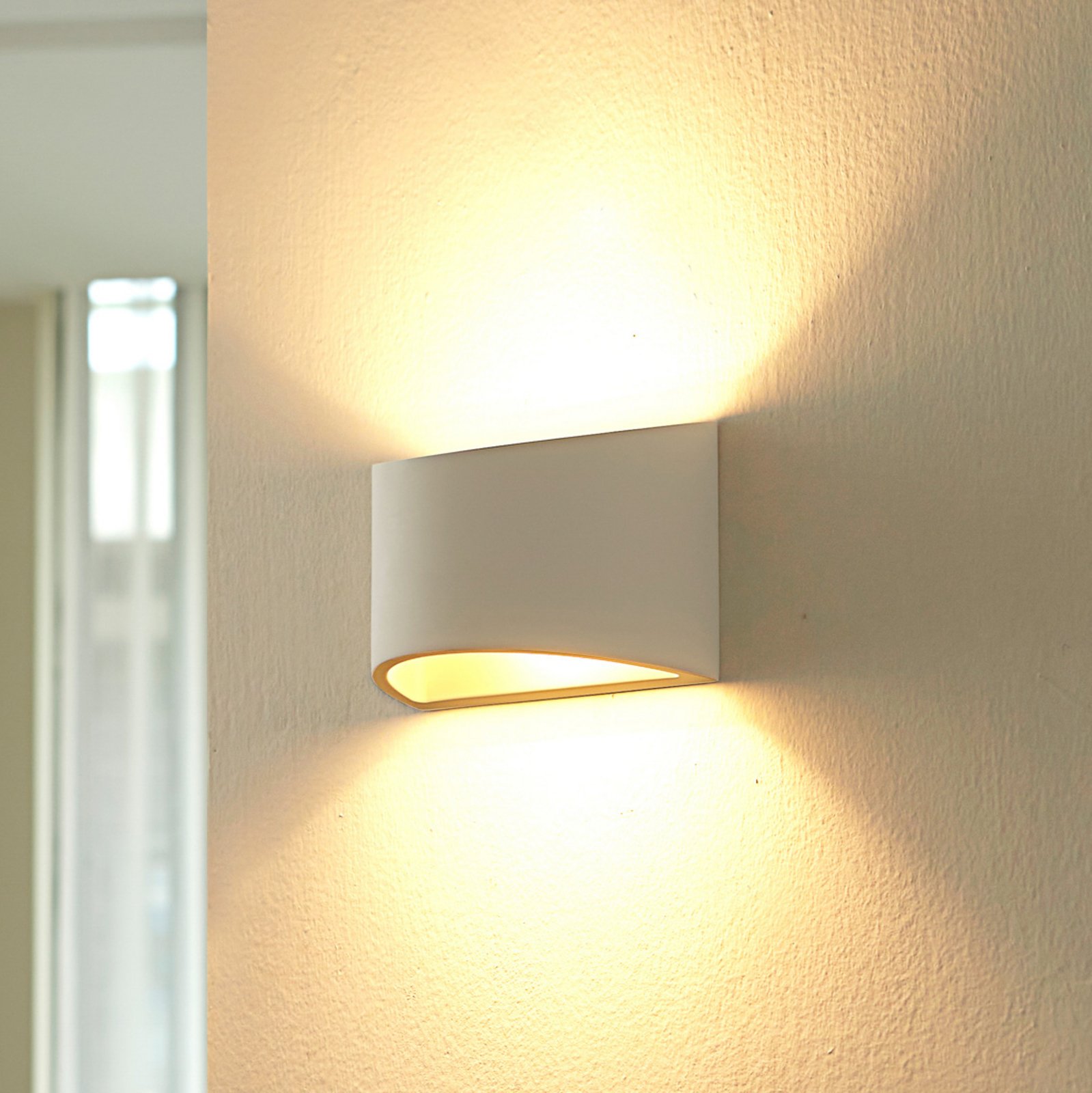 Lindby wall light Heiko, up/down, plaster, white, height 12 cm