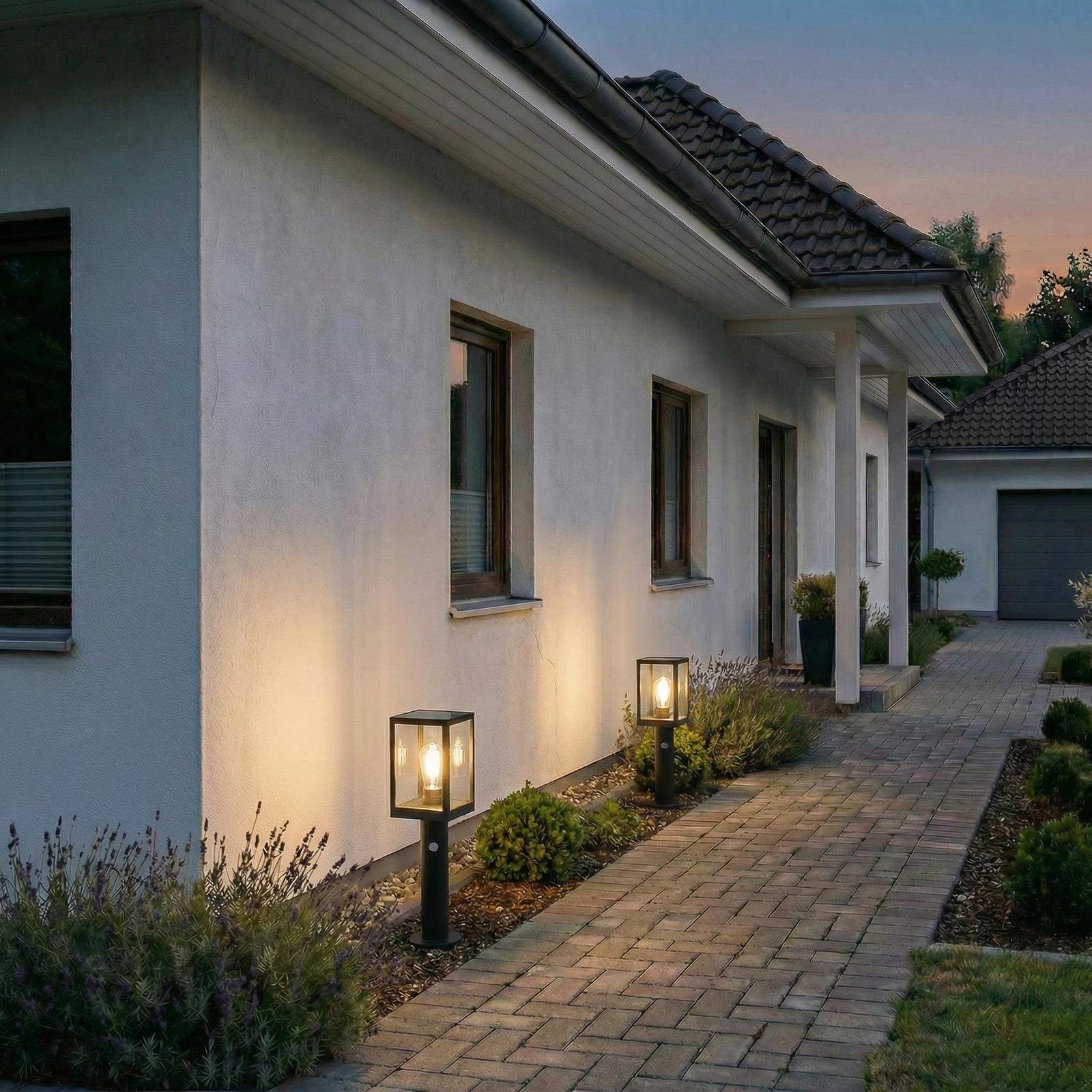 Lindby Relto, bolardo luminoso LED para caminos, sensor, pica para clavar en el