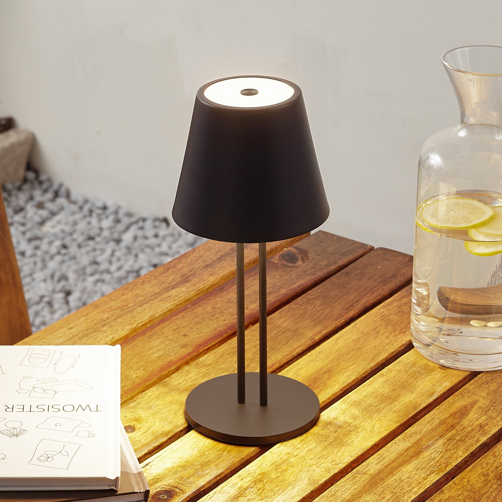 Akumulatorowa lampa stołowa LED Janea, na dwóch nogach, czarna, metalowa