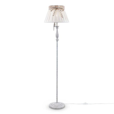 Gulvlampen Bird er dekorert med en liten fugl