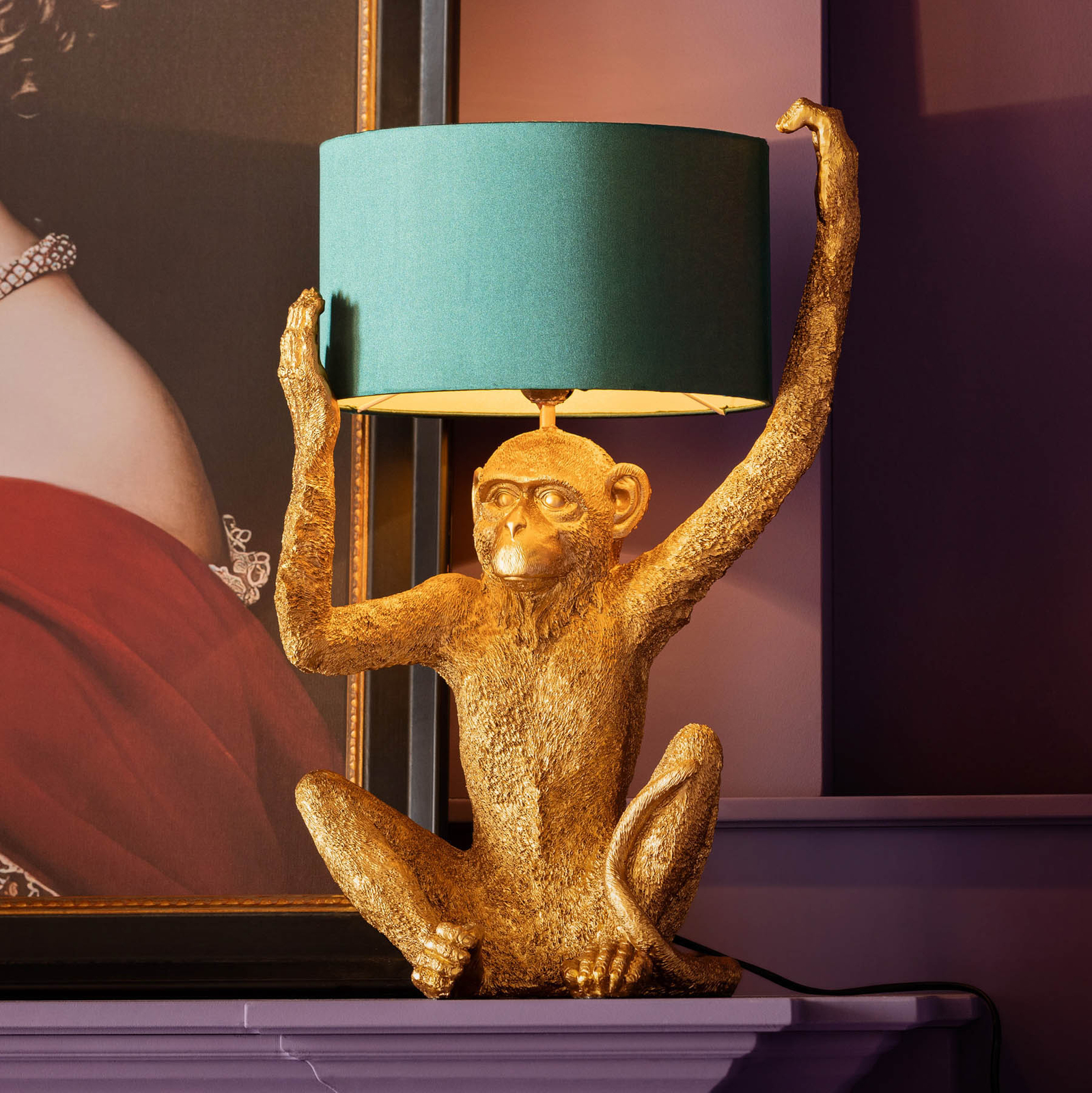 monkey holding lamp shade